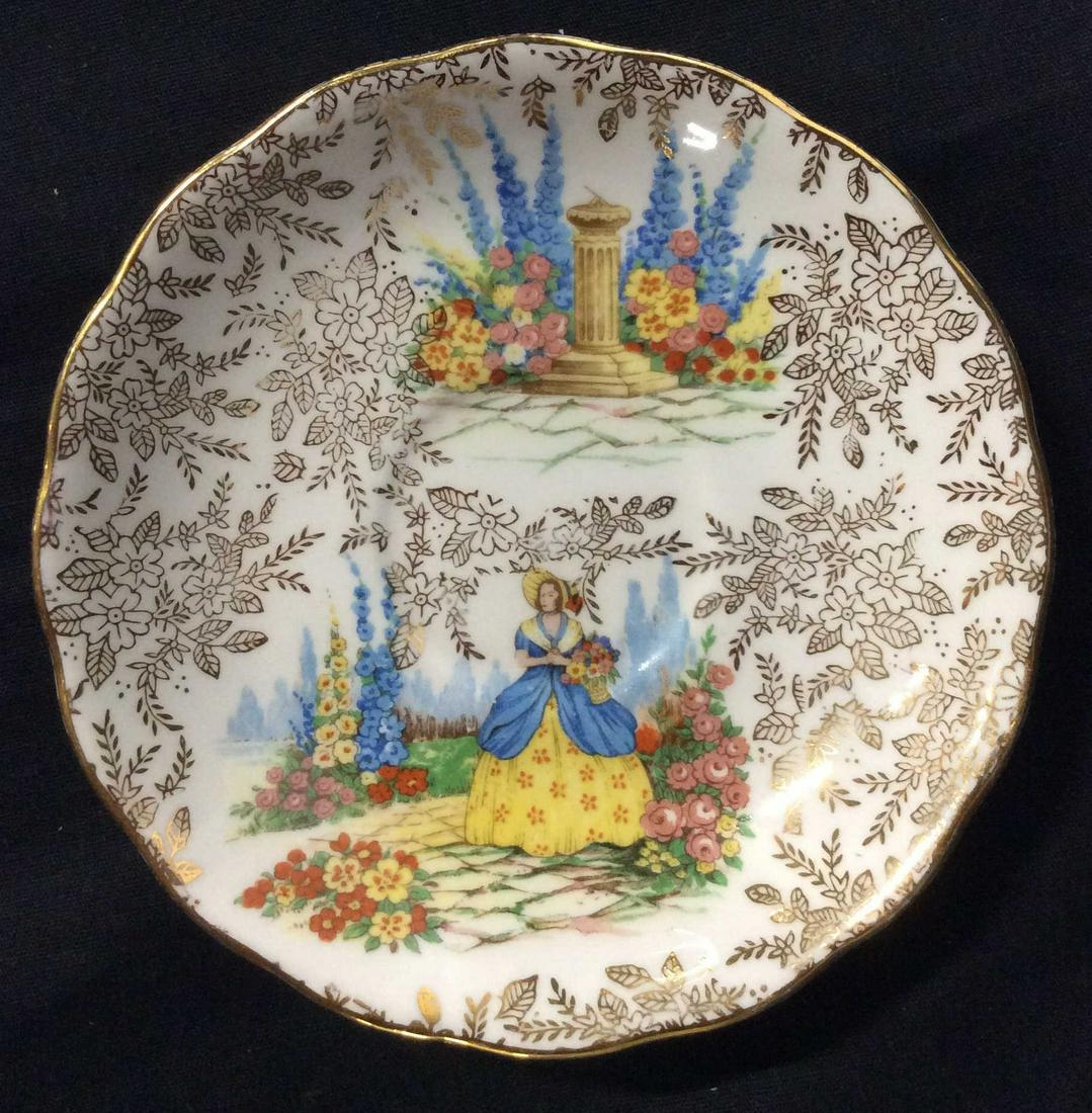 Set 3 Vintage Tea Saucers: Set of 3 Vintage Tea Saucers. Two Calclough Saucers and one Royal Albert. All three Saucers were Made in England and made of Bone China. Each Saucer measures approximately 6 inches in diameter. The Co