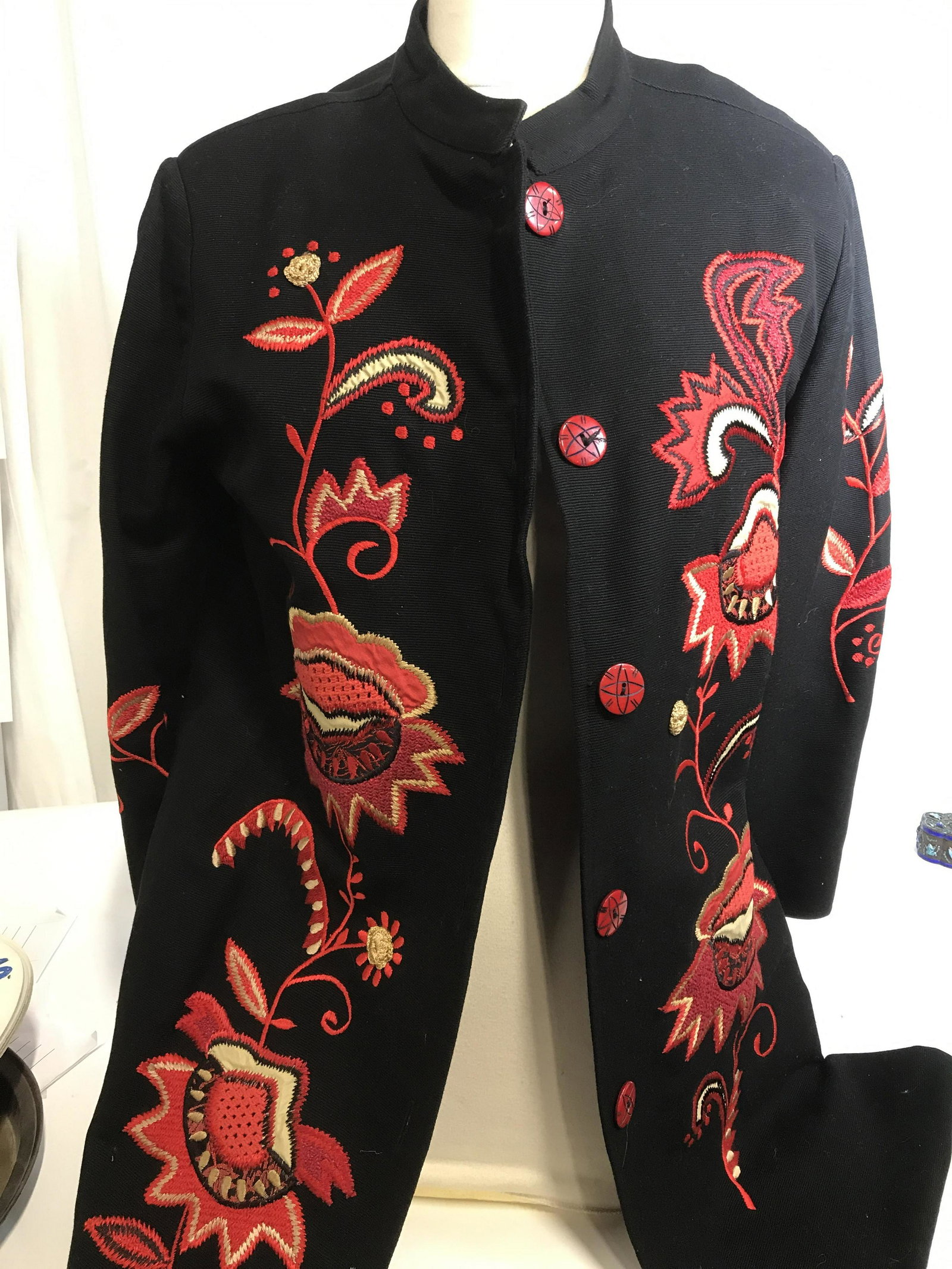 Indigo Moon Cotton Appliqué Fashion Jacket, Sm.: Black jacket with Red Venus fly trap style embroidery and appliqué design. 100% Cotton, black lining, polyester. Labels original designer & care labels affixed. Artisanal 1 in. buttons. 35 in. long, 