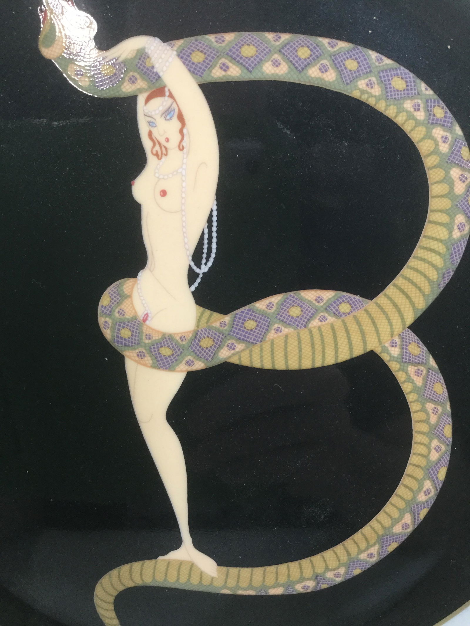 Vintage Decorative ERTÉ Ceramic Dish, Japan: This is a decorative dish, the artwork depicted is by ERTÉ, and is titled: THE ALPHABET B. There is a fixture attached to the plate allowing for wall mounting. The under side of the plate reads: ERT�