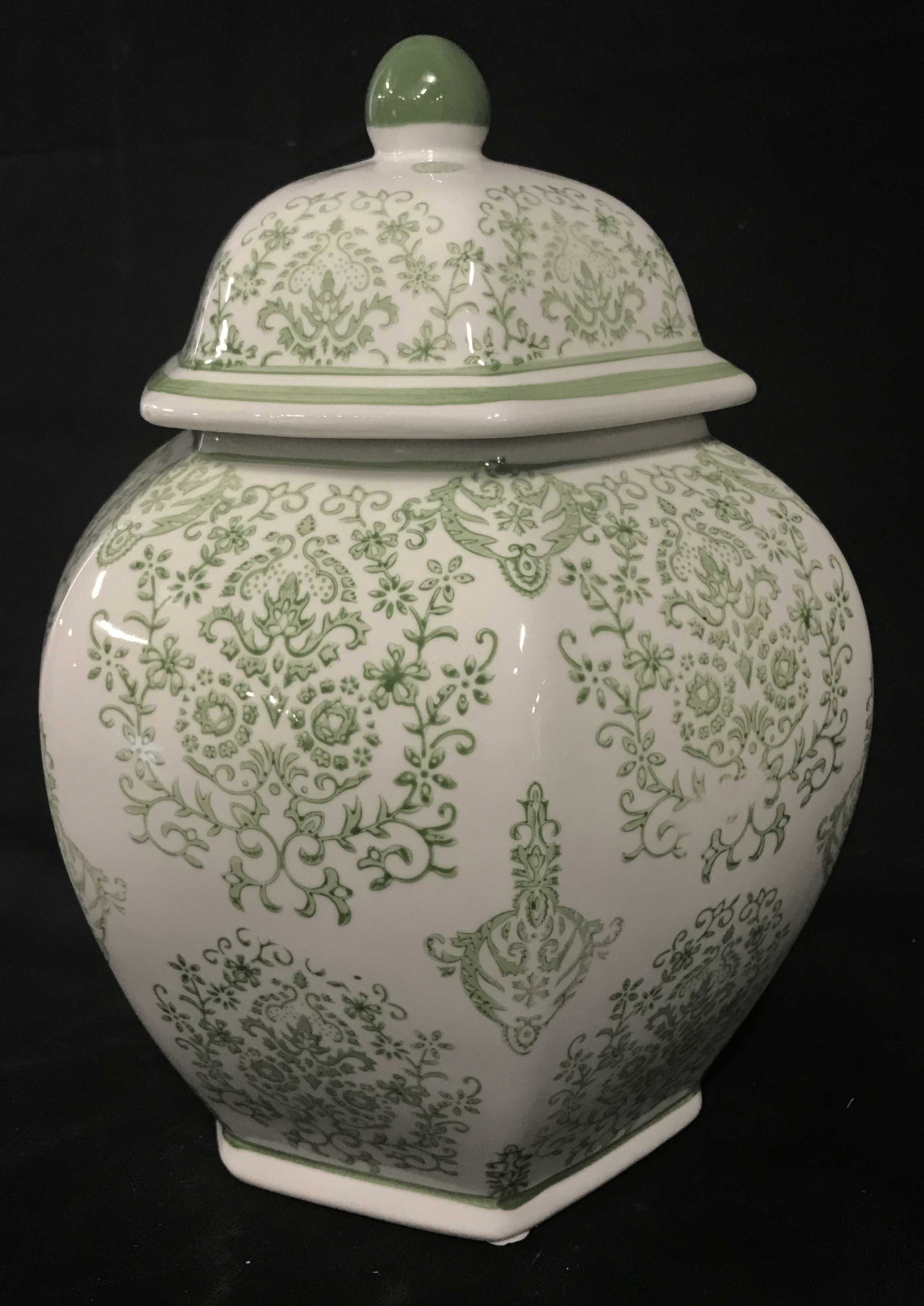 Ceramic Ginger Jar In Green and White: Ceramic Ginger jar, white with green painted designs, asian in nature, Jar in good condition no chips or cracks, measures at tallest 12 inches and at widest 9.5 inches, tableware, decorative arts and 