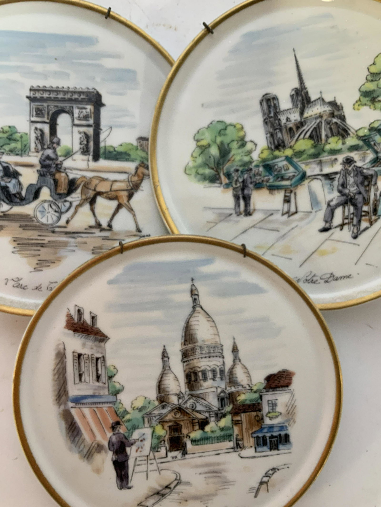 Set 3 Hand Painted French Porcelain plates: Hand painted porcelain plates each marked made in France each marked hand painted each with French landmark and scene, each measures app diameter 8 inches tableware, wall plates, shelf decor, tabletop