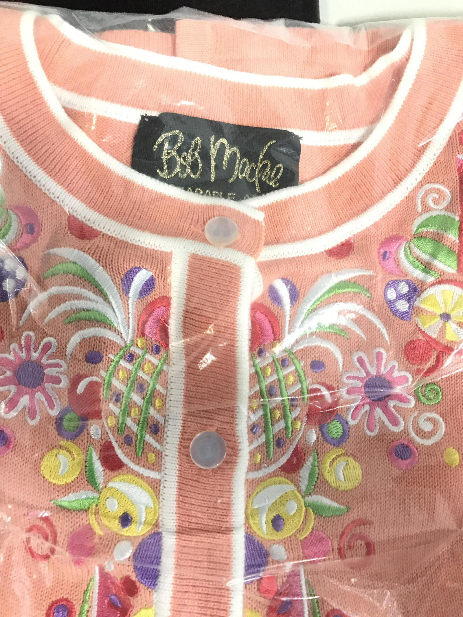 Bob Mackie Embroid. Appliqué Fruit Cardigan, New: New in package, never opened. Long sleeve button down Bob Mackie sweater from his high-end ready-to-wear line. Bright Colored Embroidered Fruits ( pineapple, watermelon, pear, orange, more) along hems