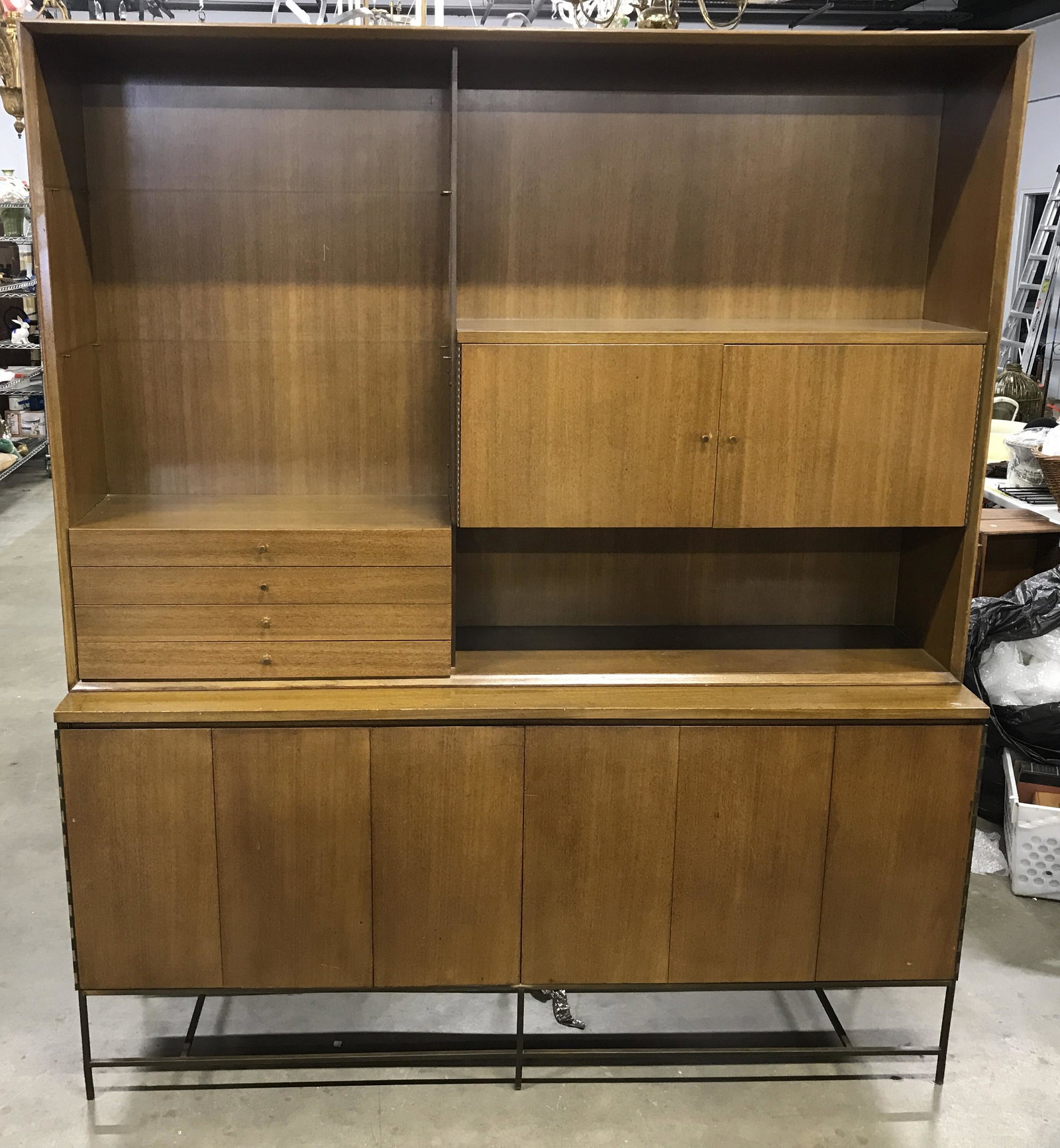 Vintage Paul McCobb for Calvin MCM Sideboard: Vintage Paul McCobb for Calvin MCM Sideboard, brown toned wooden cabinet with brass metal base, lower portion has two bifold doors that open to reveal two interior drawers above cabinets, marked on in