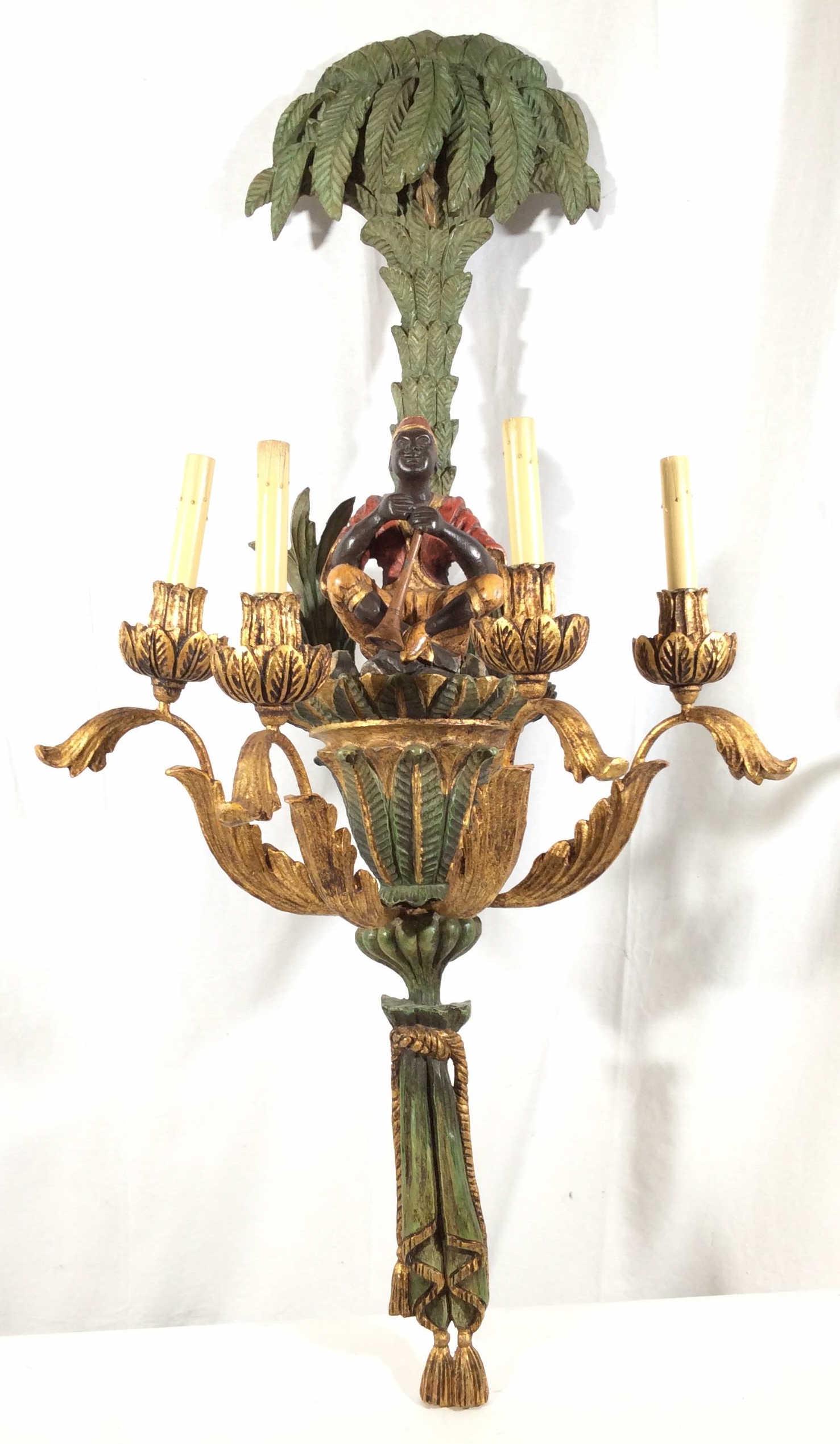 Pair Grand electrified Candelabra Wall Plaques: Carved wood ,Reverse side reads Made in Italy, primarily painted green and gold tone, tree form at top, musician Figurals rest on shelves, not attached, filigree arms to candelabras, carved rope and f