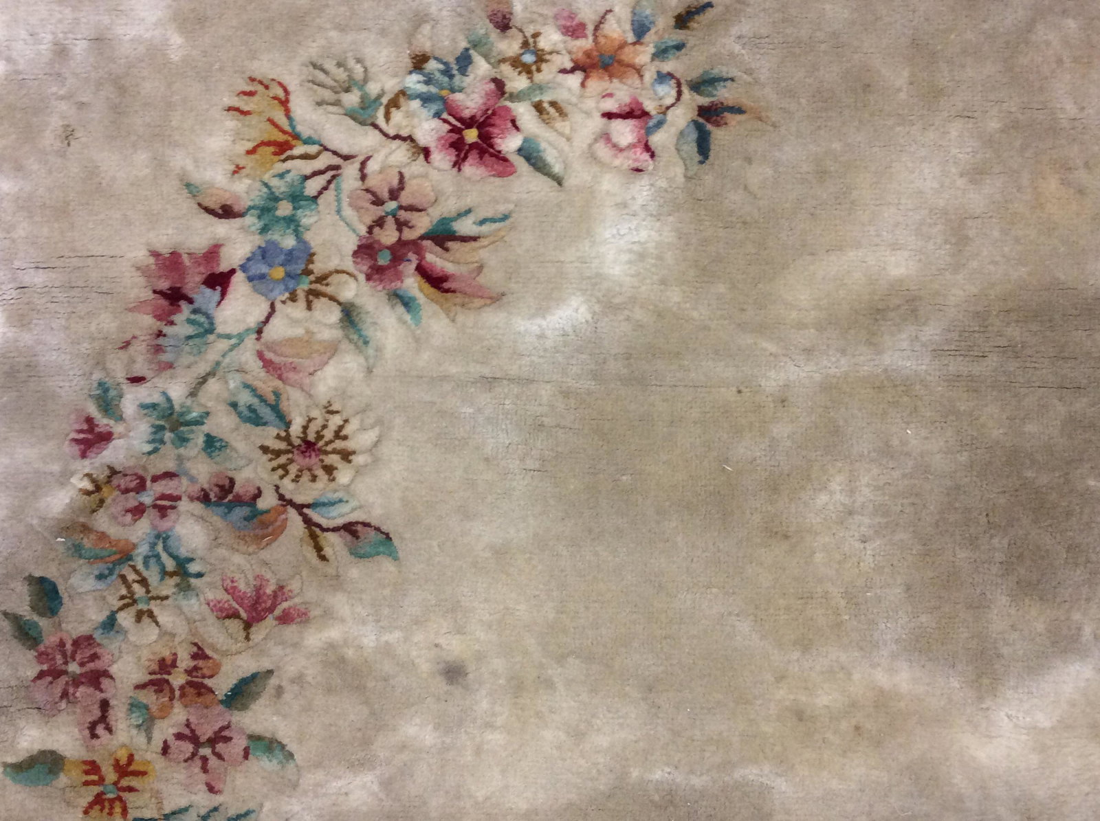 Vintage Floral Design Area Rug: Rug is wool & handmade. Rug contains fringes. Contains multi toned floral art in opposing corners. Contains tones of aqua, brown, tan,cream, light green & Maroon. Rug, carpet, area rug, area carpet, h