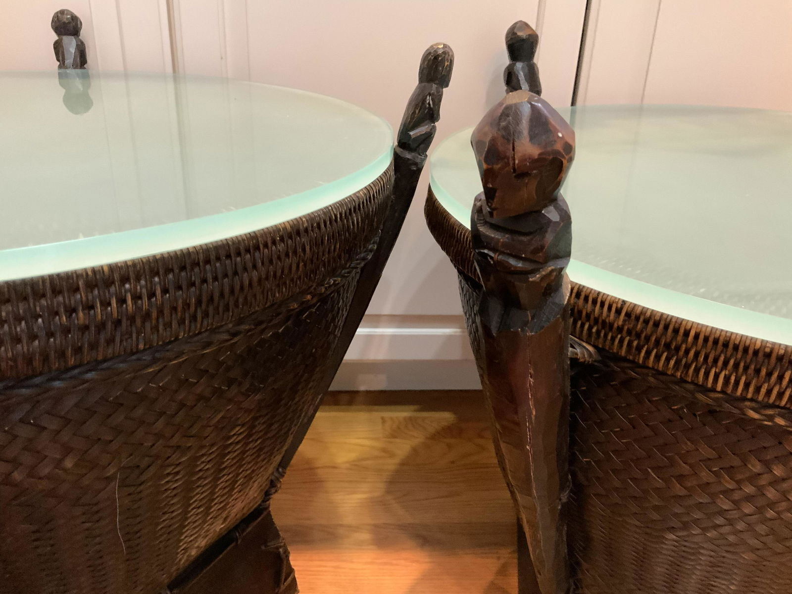 Pair Glass Topped Tribal Drum Tables: Custom glass fits among carved sides with Figural Animal head finials, rattan and woven tables, photos show with and without glass, rattan tops removable for storage, or original use, end tables, side