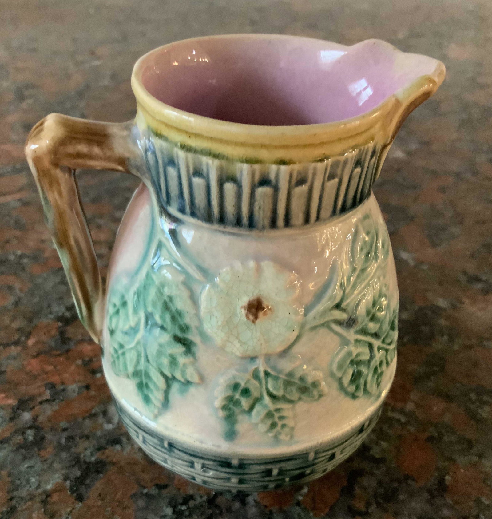 Antique Majolica Floral Design Pitcher: Colorful glazed pottery, ceramics, collectible table ware, antique Majolica pitcher, vessel, vase measures 5 by 5 inches, glazed pink interior, trade mark design underside