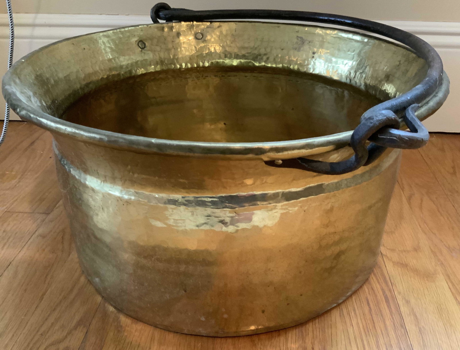 Antique Hand Worked Brass Pot w Bail Handle: Antique Floor size brass pot, hand crafted, iron swinging handle, fireplace accessory, decorative arts and crafts, antique brass ware, measures ht to handle base 9 inches, diameter 16 inches