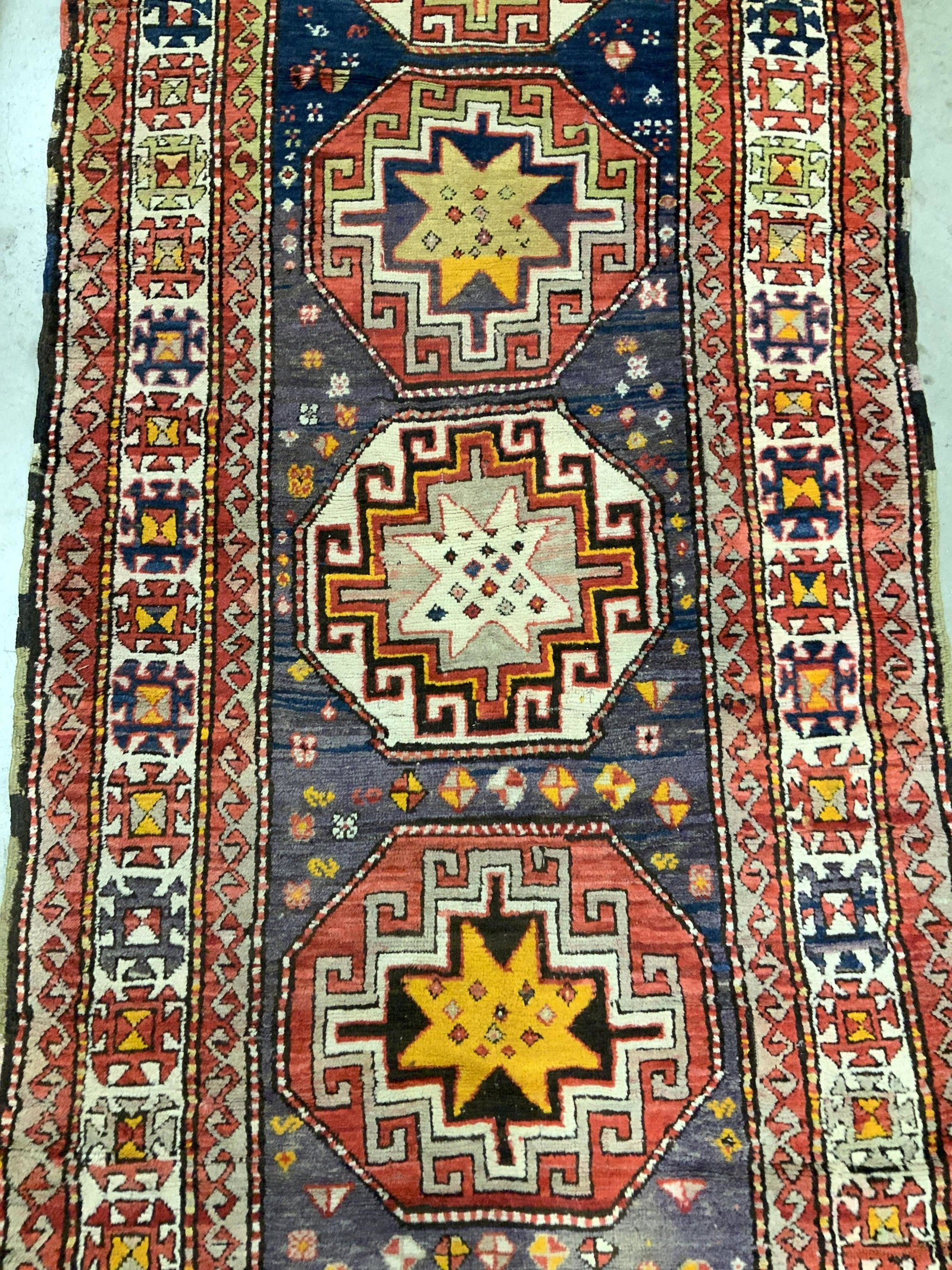 Antique Handmade Turkish Wool Rug: Rug is wool and handmade. Rug is antique. Rug has intricate multi toned geometric detail. Rug has very short fringes. Rug, carpet, area rug, area carpet, wool rug, handmade rug, antique rug, Turkish r