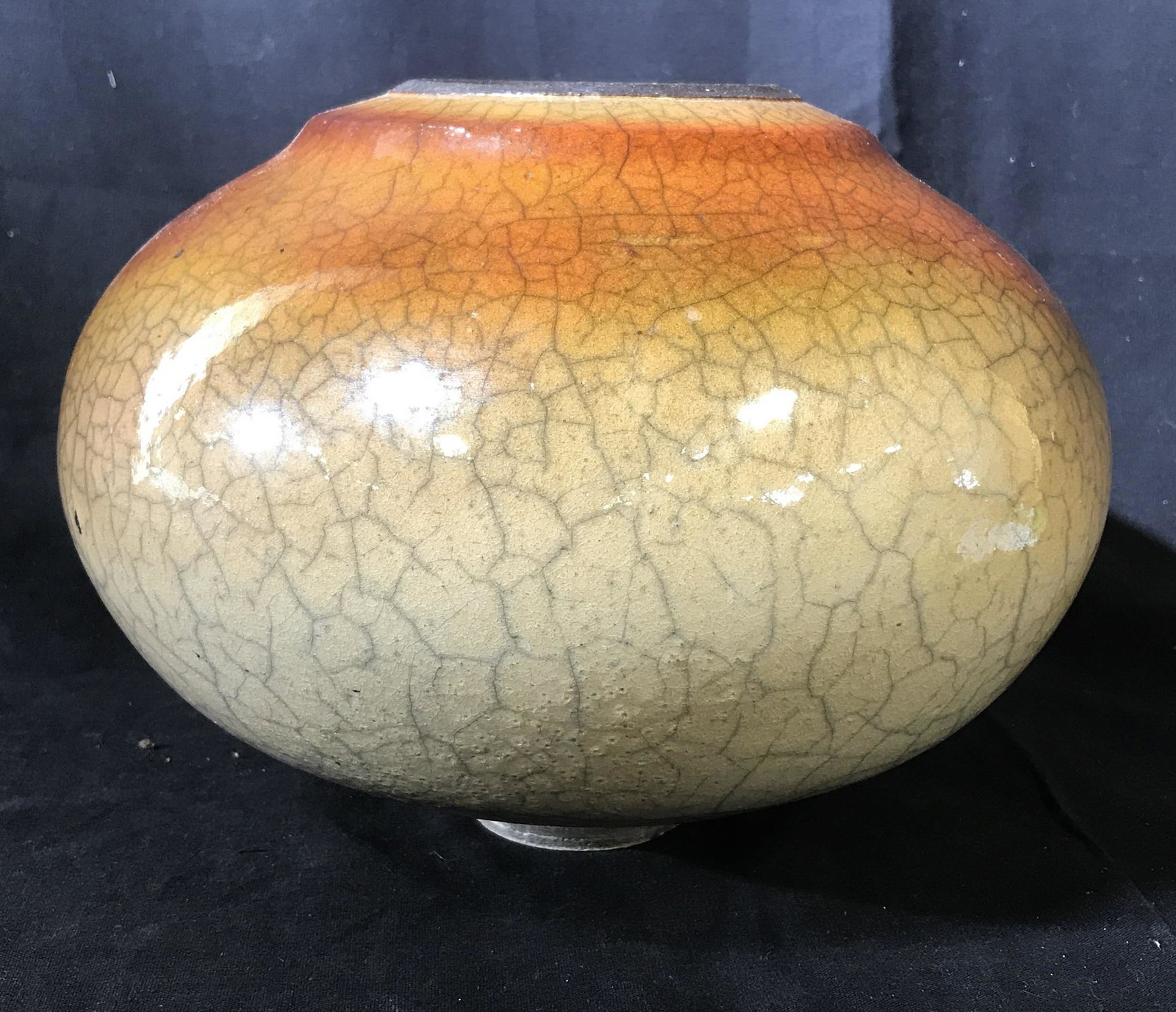 Signed MCM Glazed Pottery Vessel: Signed illegibly on underside, short pedestal base with elongated orb form vessel, Amber to cream tones, crackle glaze, and glossy sheen to finish, hand crafted art vessel, vase, tableware, mid centur