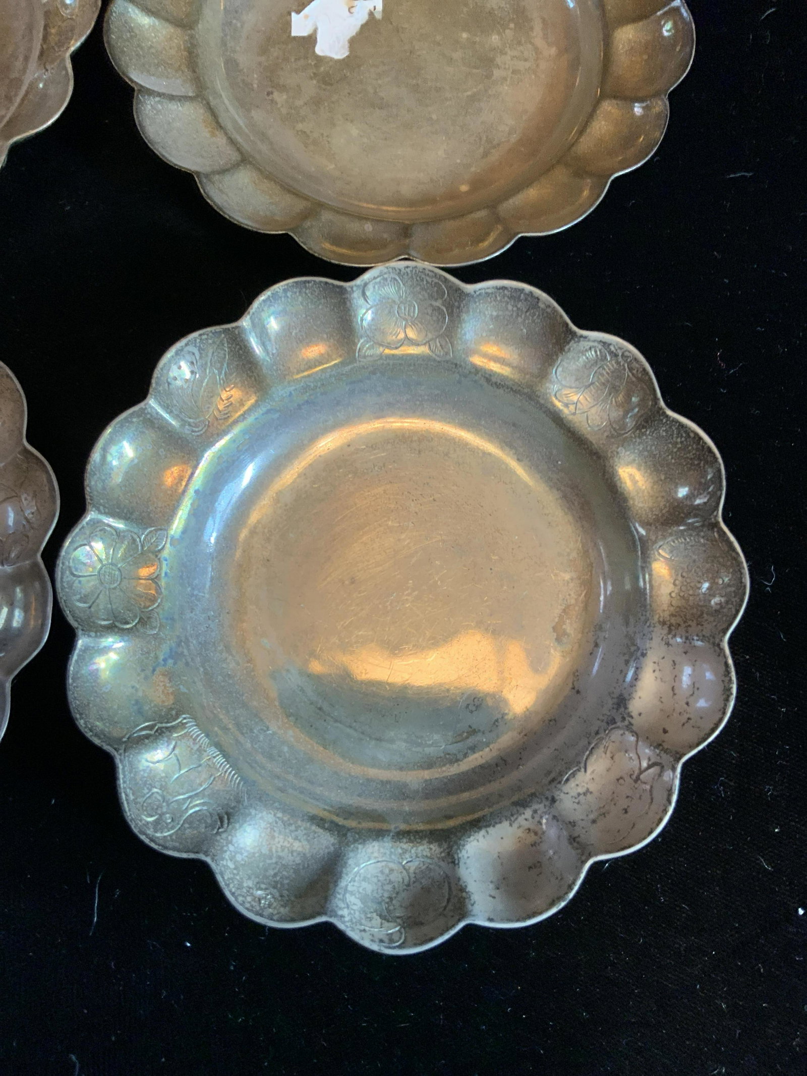 Set 4 Sterling Silver Plates: Each marked 925 for sterling silver, each measures 4 inch diameter ht app 1 inch, each weighs 40.3 dwt, total weight 161.2 dwt, marked Otto J Scheer, 620 fifth avenue, New York City tableware, tableto
