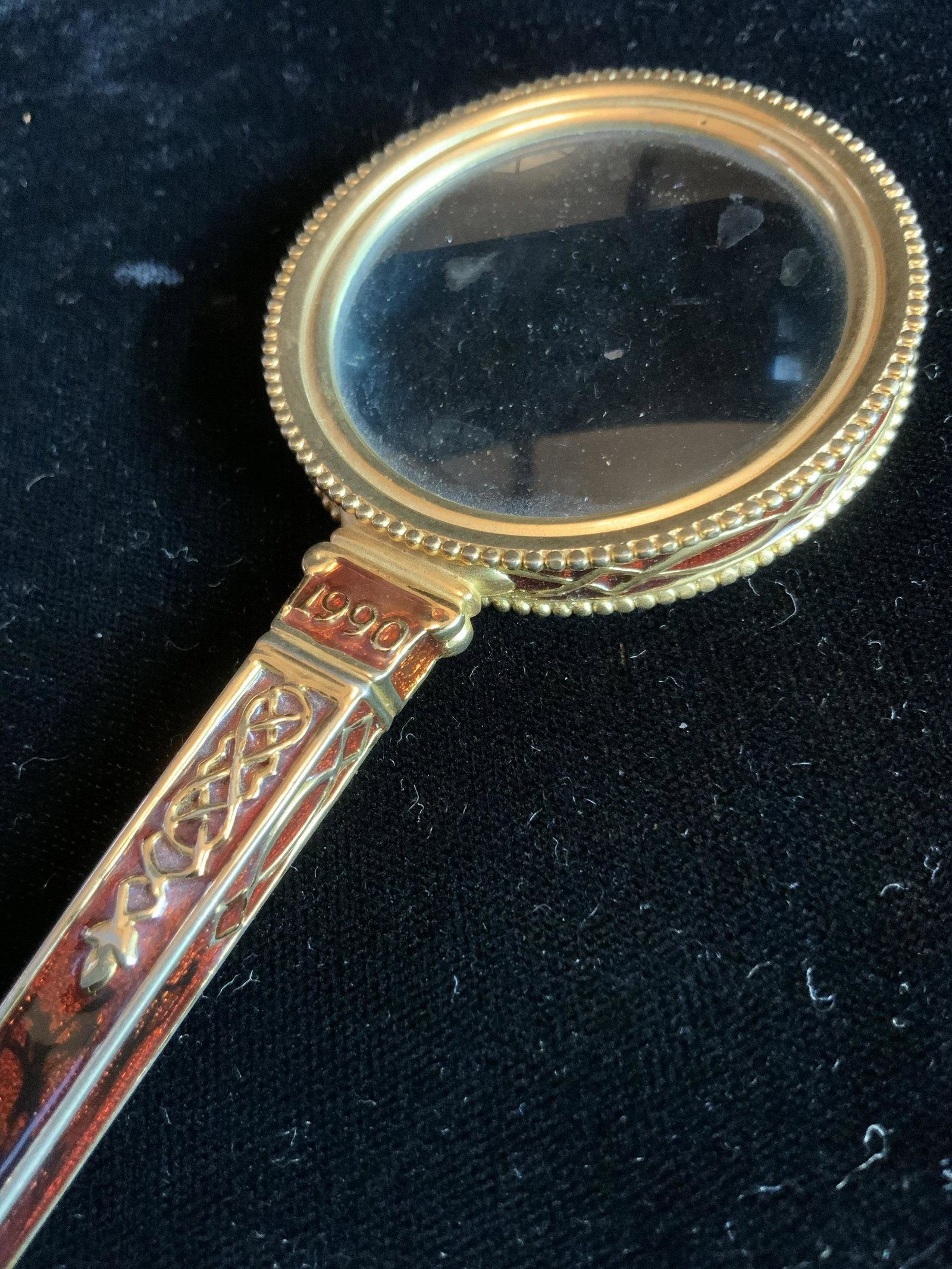 Bejeweled Enameled Gold Toned Magnifying Glass: Desk accessory, vintage magnifier, handled magnifying glass, measures length 5.25 inches diameter app 2 inches, one side has 1990 inscription, one side 1995