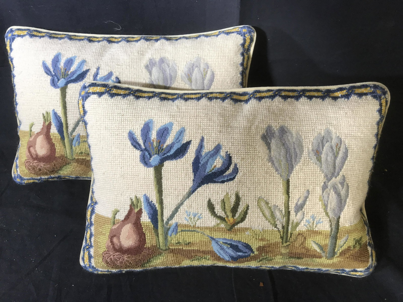 Pair Crocus Needle Point Throw Pillows: Toss pillows, decorative accessories, home accent, textile arts and crafts, needlepoint pillows with colors of blue cream and tans, crocuses in garden setting, property of Wilton Conn Estate, each mea
