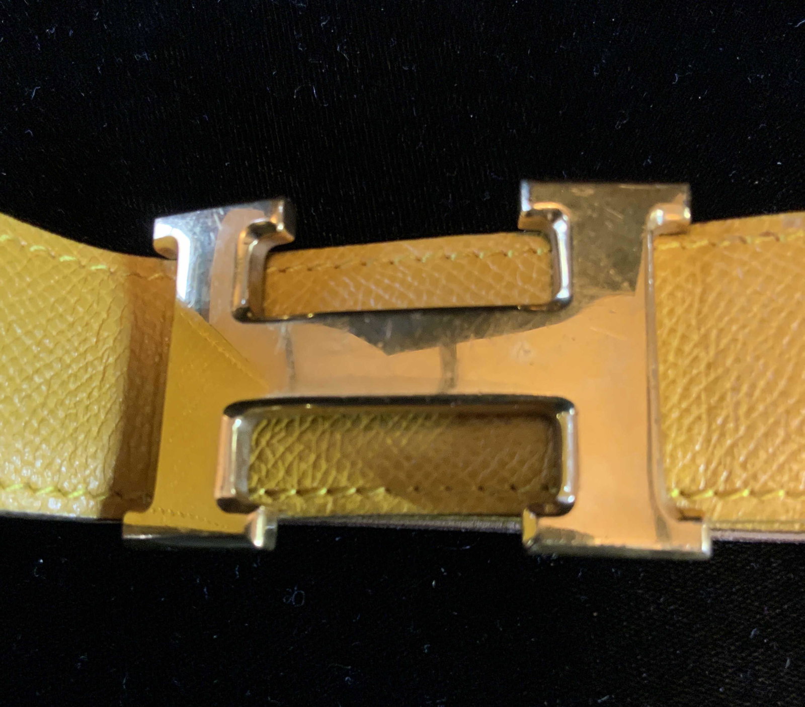 HERMES Brass H Leather Belt, Never Worn: Like new leather belt, With large center H Brass Buckle engraved and marked for Hermes, luxury French Fashion, Designer Belt, like New Condition,reversible leather mustard yellow on one side, camel to