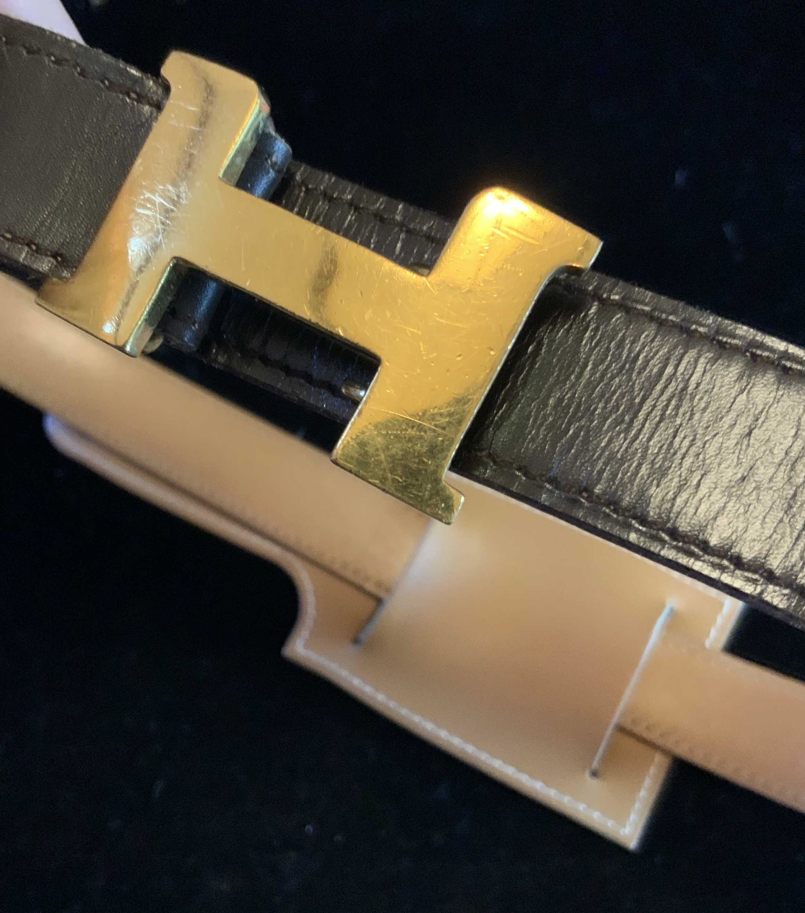 HERMES H Buckle Leather Belt, France: Luxury Designer Hermes Leather Belt, reversible chocolate leather and Camel toned leather, center buckle is Iconic Letter H measures 1.75 inches by 1.25 inches, reversible leather belt measures app 36