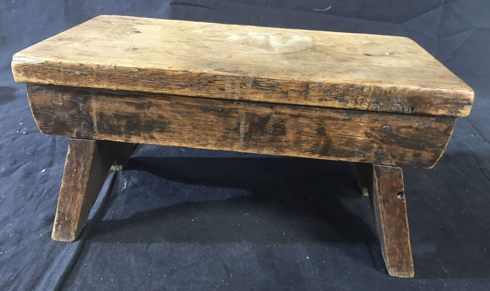 Antique Wood Milking Stool: Country collectible, milking stool up cycle, decorative accessory, foot rest, foot stool, seat, step stool ,Measures 6.5 inches top 12 by 6 inches, antique store label reads oak stool from farm in Leh
