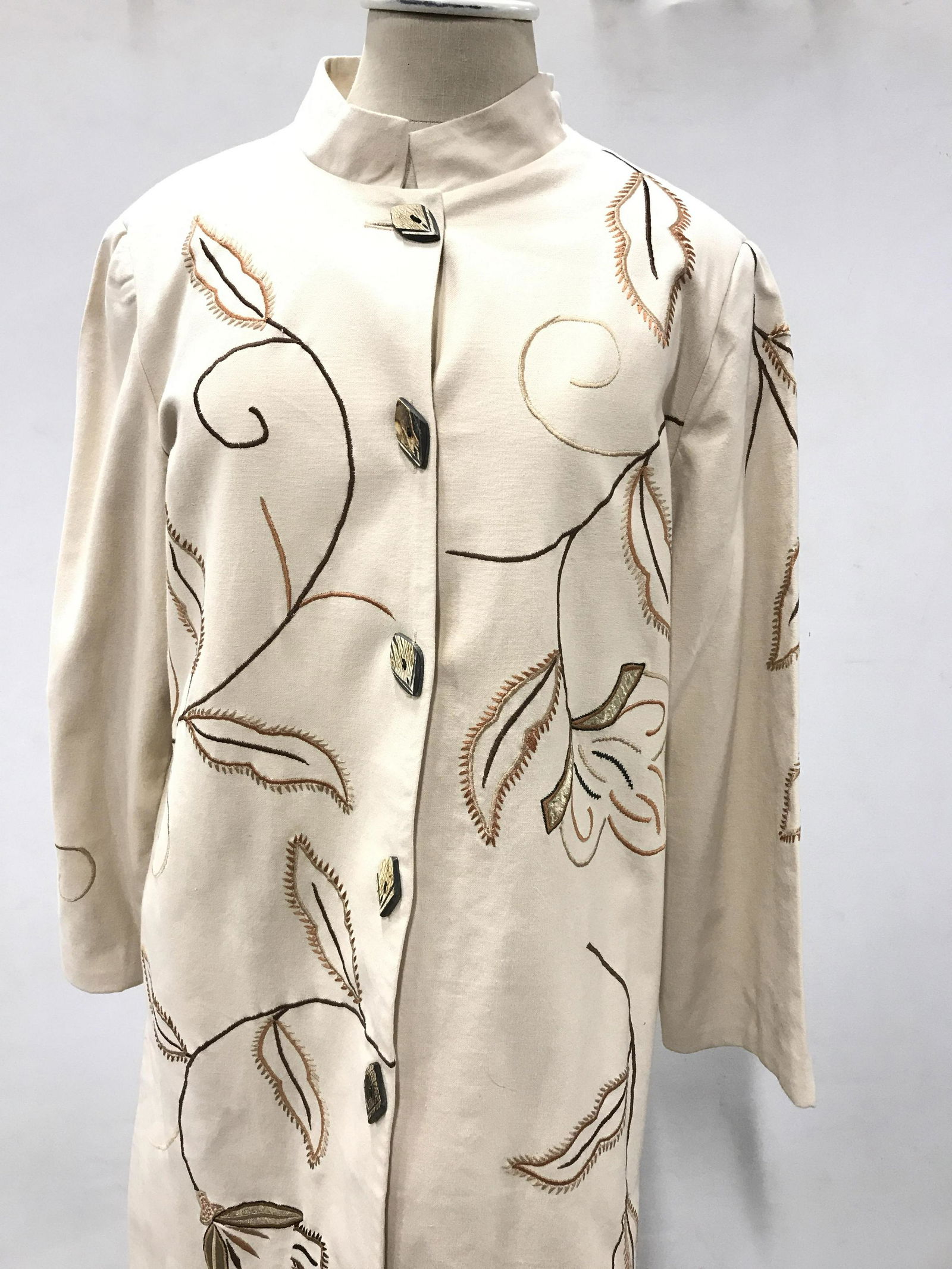 INDIGO MOON Vintage Trench Coat: Lovely vintage beige embroidered floral trench coat with wooden buttons and slits on either side. Made in India. Size small. Embroidery, embroidered coat, high fashion, street wear, long coats, vintag