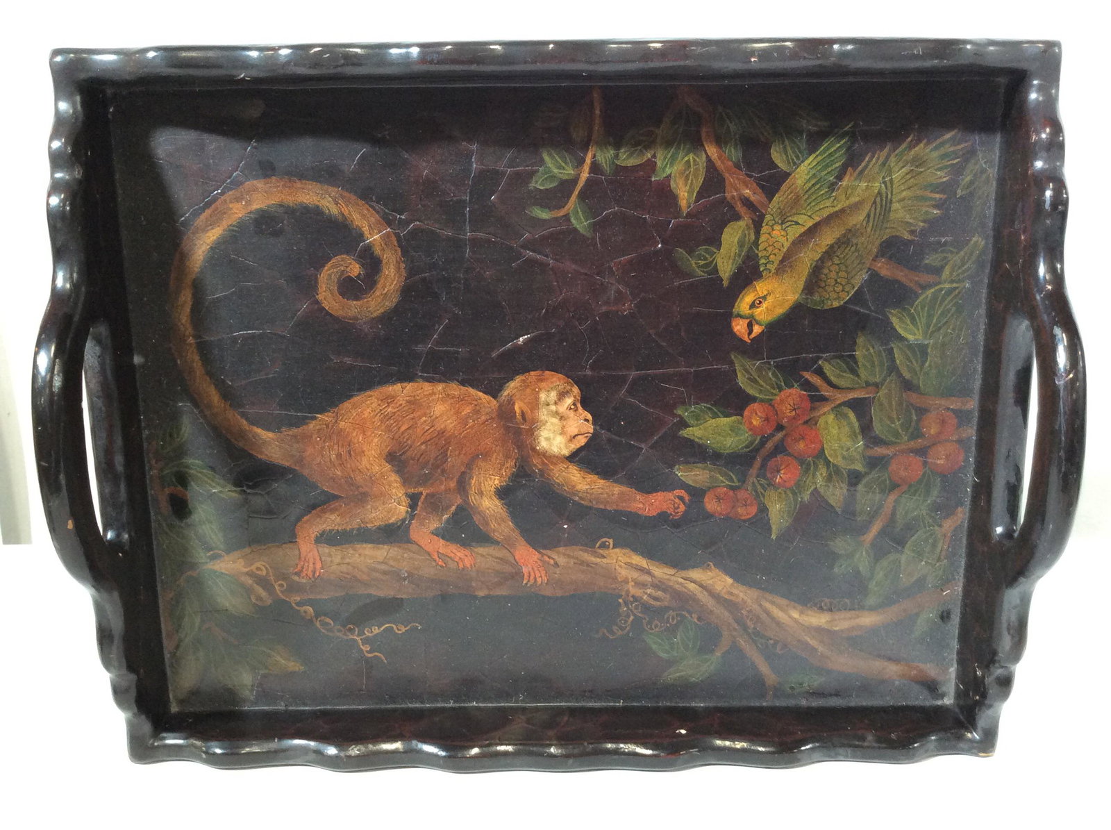 Vintage Hand-painted Wooden Serving Tray: This is a vintage Hand painted serving tray, the piece is crafted from wood. The artwork depicts a monkey hesitantly reaching for fruit beneath a bird. The piece measures approx 4 inches H and 18 inch