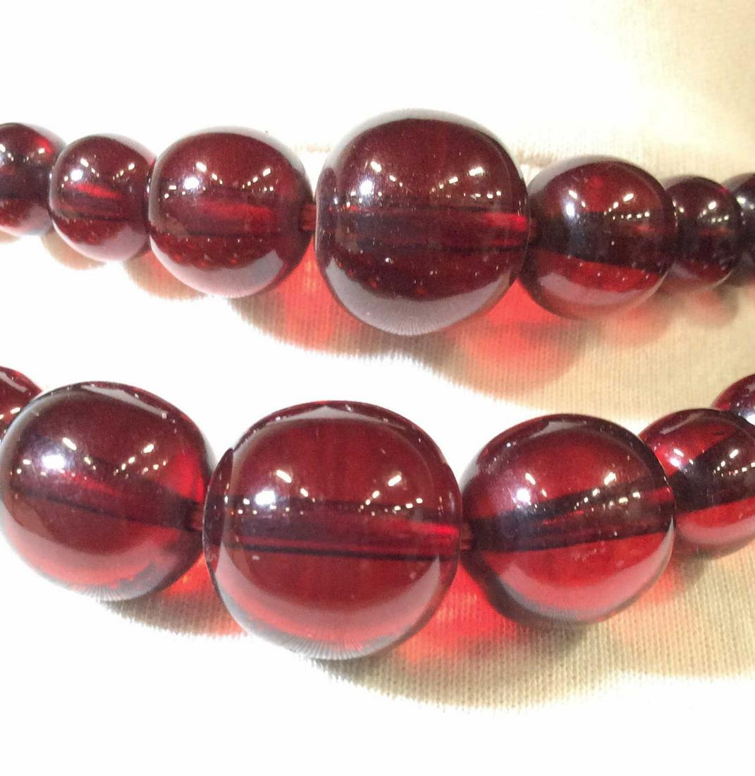 Pair Vintage Cranberry Resin Choker: One 12 in., one 14 in. Semi transparent Ruby Red/ cranberry beads, larger center beads, app 15 in. Snap closure. Vintage Necklaces, Ruby Red Beads, Choker Necklace, Set Necklaces, Ladies Fashion Acces