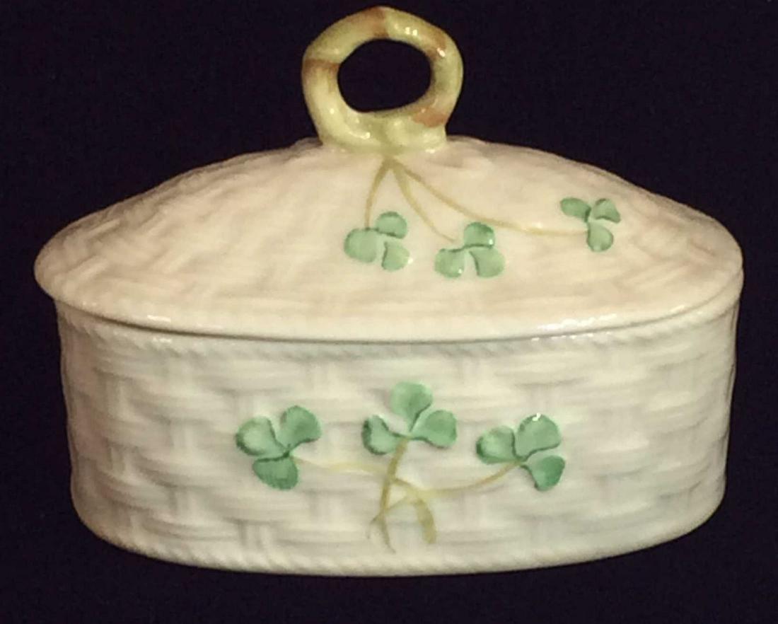 Belleek Fine China Trinket Box, Ireland: Basket Weave Embossed Porcelain with Painted shamrocks. Lid with open circle knob. Hallmark on underside, reads Belleek in Retrospect Belleek 1999. info card on the tradition of Belleek porcelain. 3 3