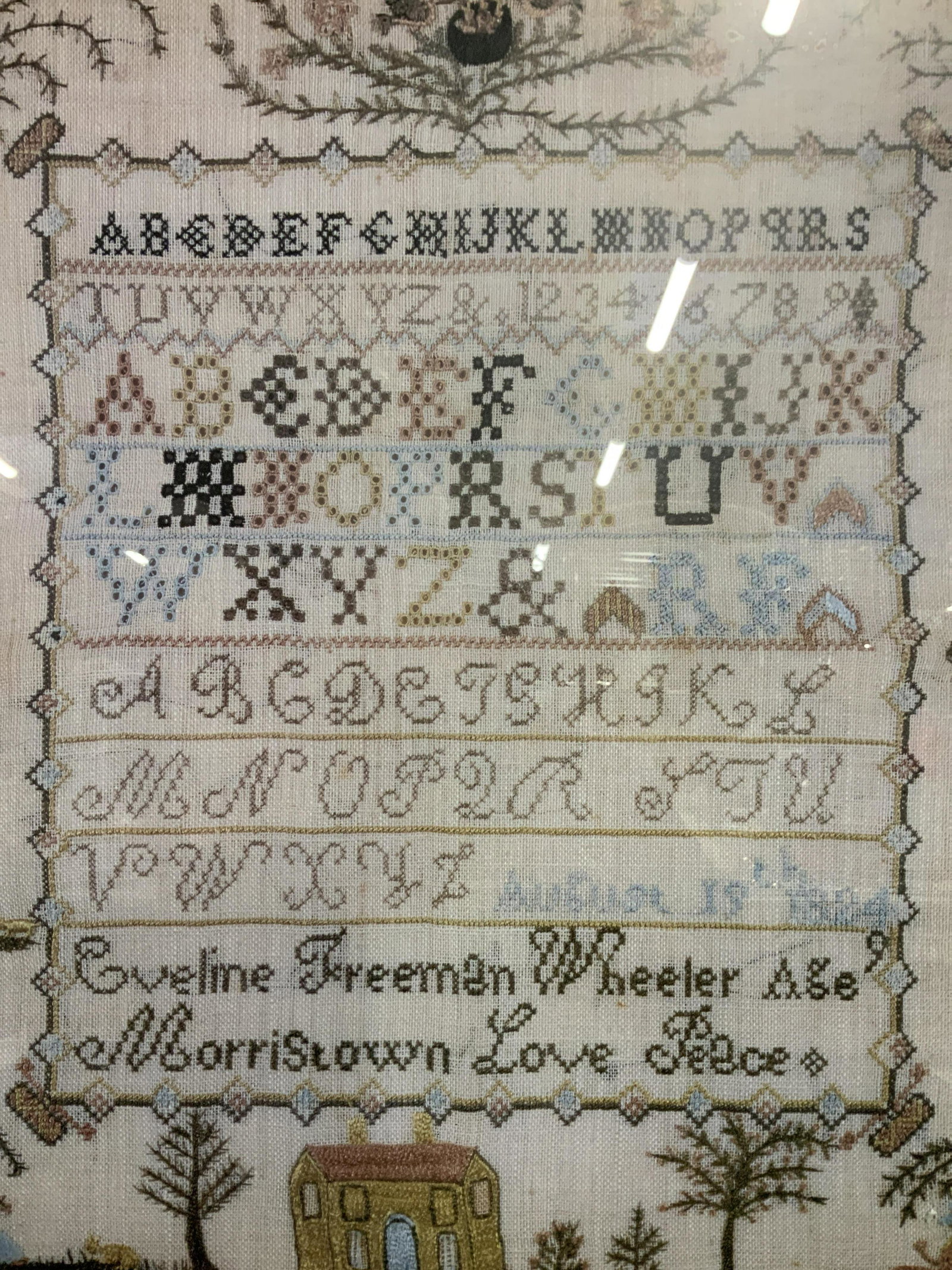 Print of Embroidery Sample: Print of Quilt Embroidery, embroidery sample, depicts the alphabet in multiple fonts, possibly embroidery practice, the lower center section reads Eveline Freeman Wheeler A&e Morristown Love Peace, no