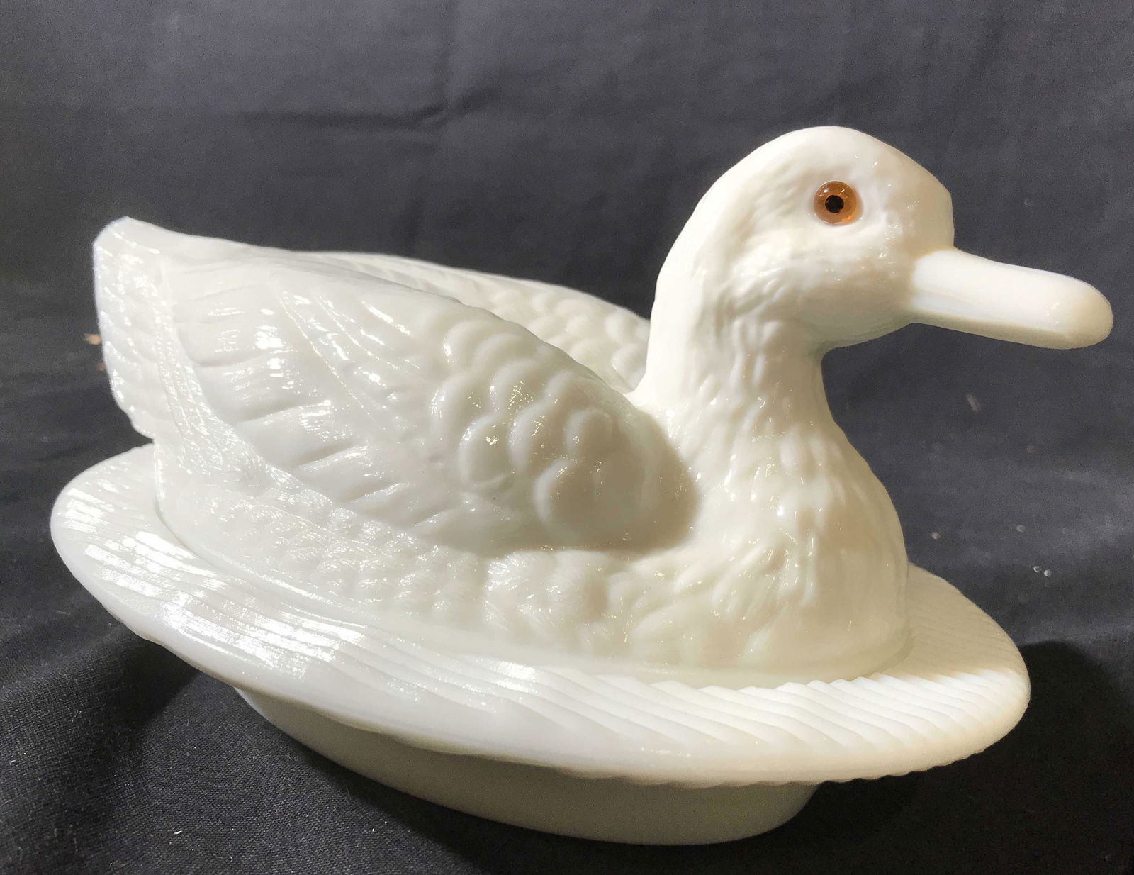 West Ireland Glass Co Milk Glass Duck Vessel: Vintage possibly antique collectible Milk Glass lidded vessel, detailed duck form on wavy bowl, amber toned glass eyes, measures app 6 inches ht length 11 inches. ollectible Milk Glass Table Ware coll