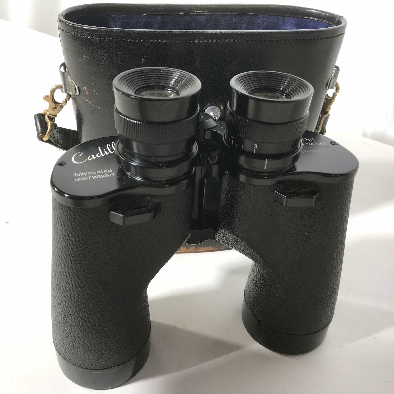 Cadillac Supreme Binoculars w Leather case: Binoculars read Cadillac Supreme, fully coated light weight, Supreme, 10 by 50, model number 7060, k7-11085, 367 ft at 1000 yards, ht 7.5 inches Stadium Accessory, Wildlife Accessory, Long Distance Vi