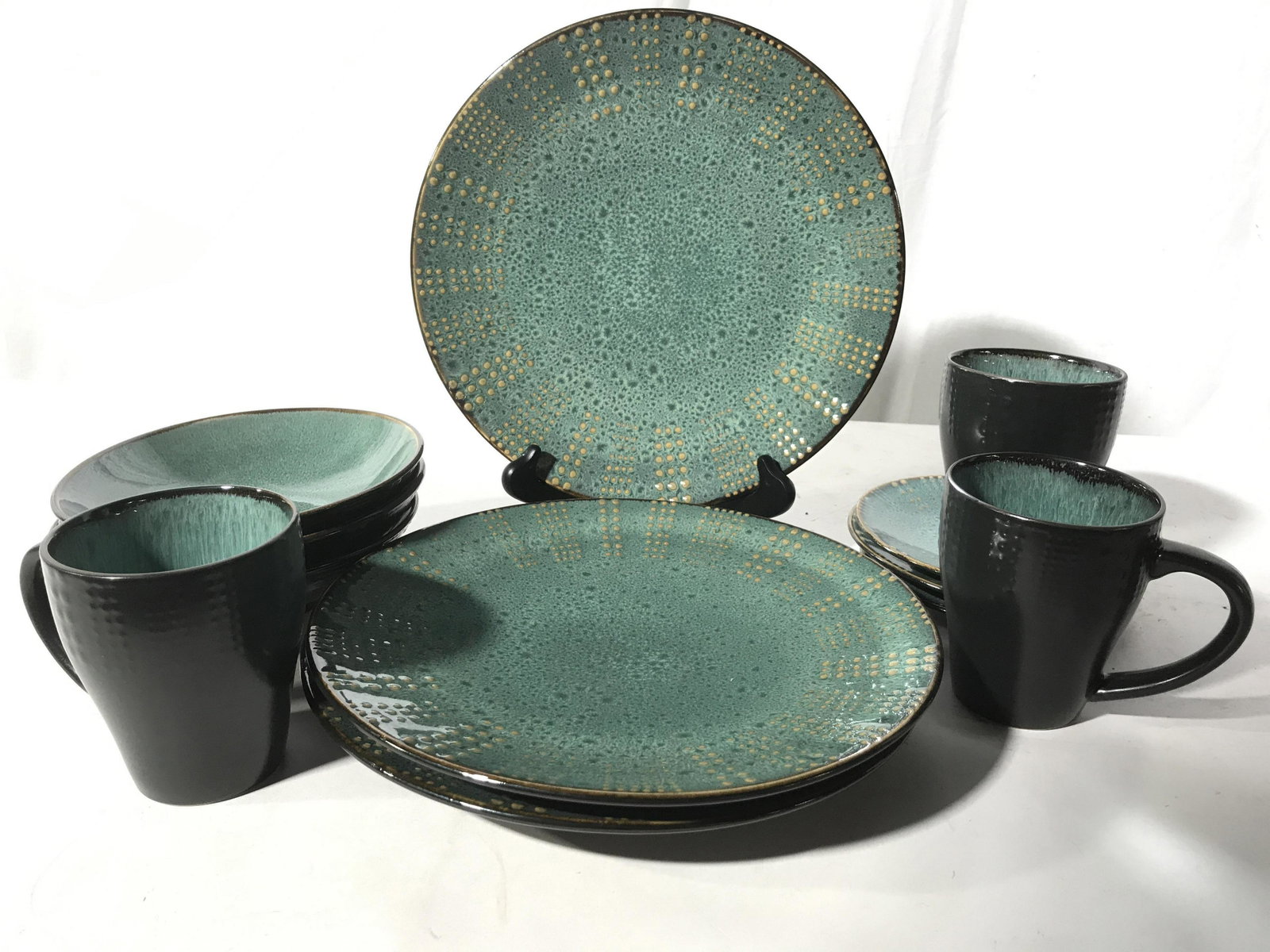 MIKASA Gourmet Basics New Ceramic Place Settings: MIKASA Service for three includes mugs, bowls, dinner plates diameter 11 inches, salad plates, underside reads gourmet basics, textured dotted teal glaze, underside matte black, new old stock, never u