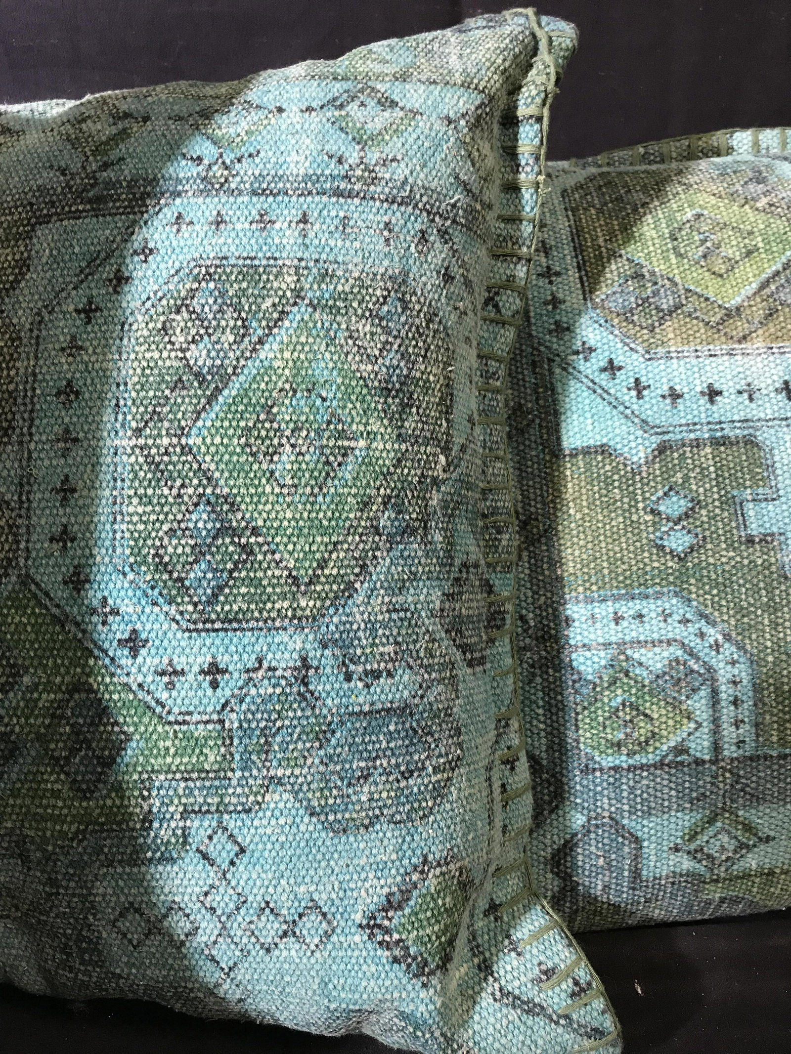 Set 3 World Market Turquoise Toss Pillows, India: Three decorative accessories, throw pillows, toss pillows, one has tag reading world market, made in India, 18 inches square