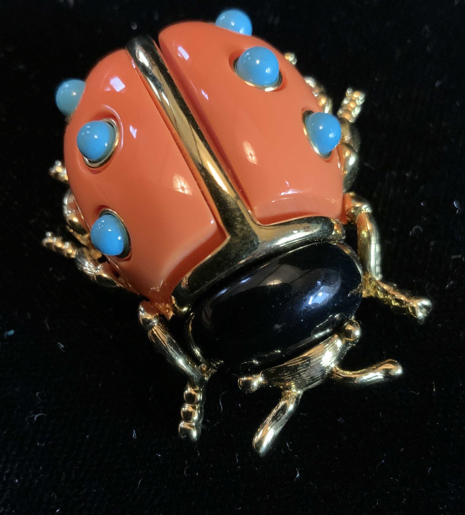 Kenneth J Lane Lady Bug Brooch: Luxury jewelry designer fashion brooch, orange enamel lady bug with aqua tone accents, black and gold tone detailing, marked underside KJL, measures length 1.75 by 1.75 inches jewelry, estate jewelry,