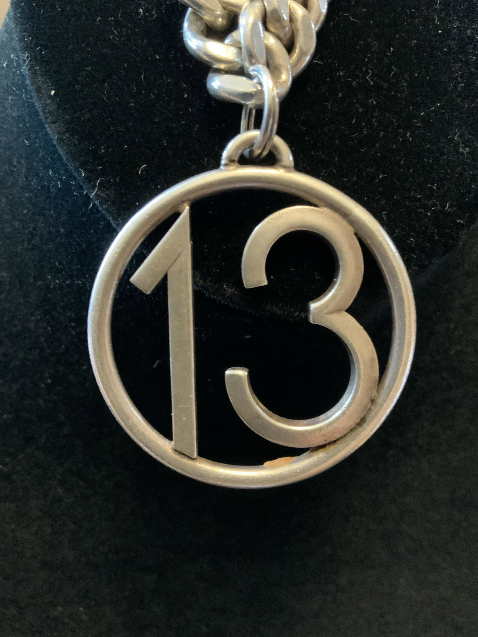 NAPIER STERLING Silver Charm Bracelet: Heavy and Chunky link chain bracelet with pendant 2 inches Diameter of circle casing number 13, pendant marked for sterling and clasp marked for Sterling and signed Napier, vintage designer jewelry, b