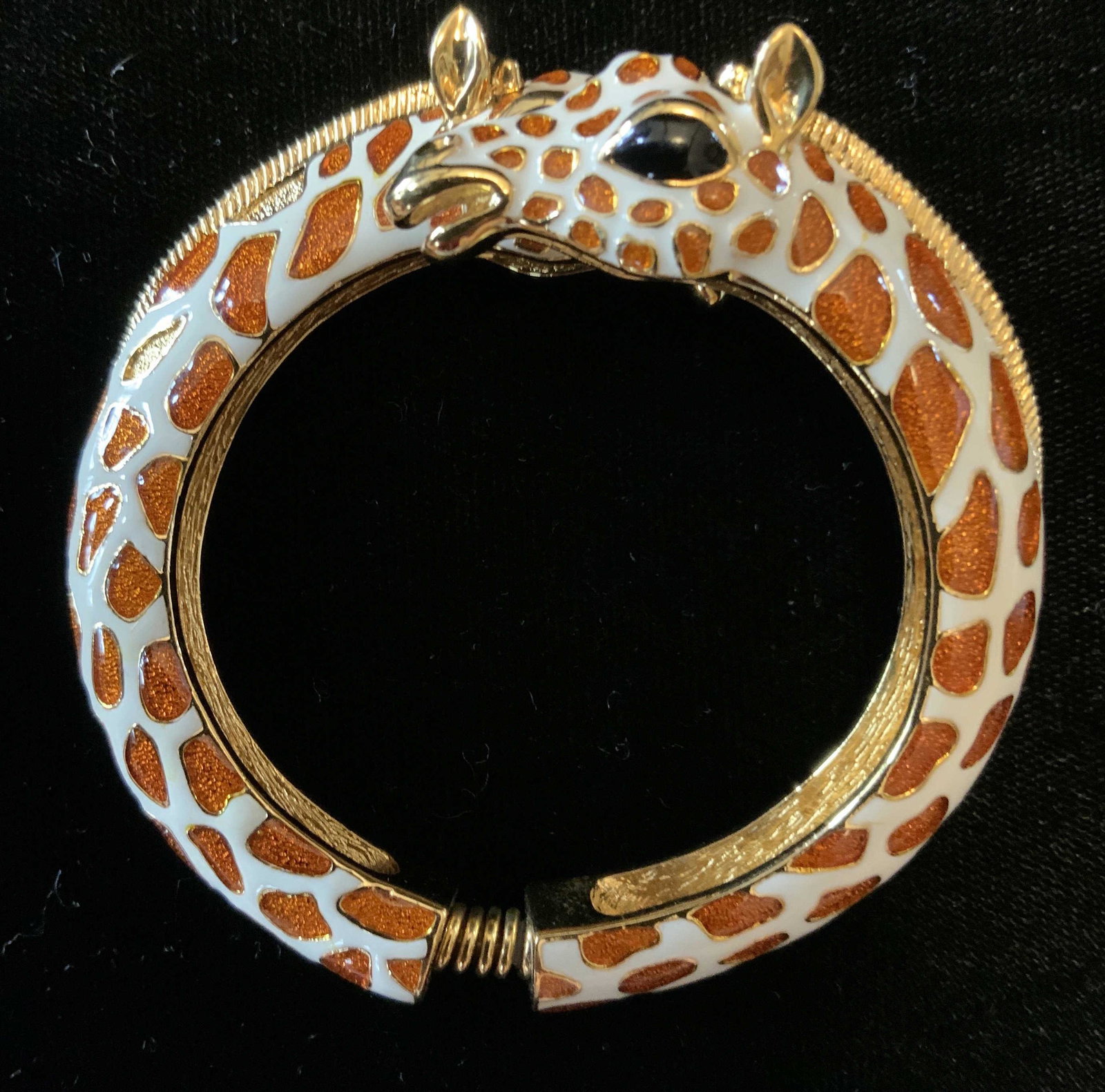 KJL Enameled Jeweled Giraffe Bracelet: Double headed Giraffe form bracelet with enameled and gold toned spring hinged cuff, statement vintage jewelry, estate jewelry, designer costume jewelry, Kenneth J Lane, signed piece, enameled bangle 
