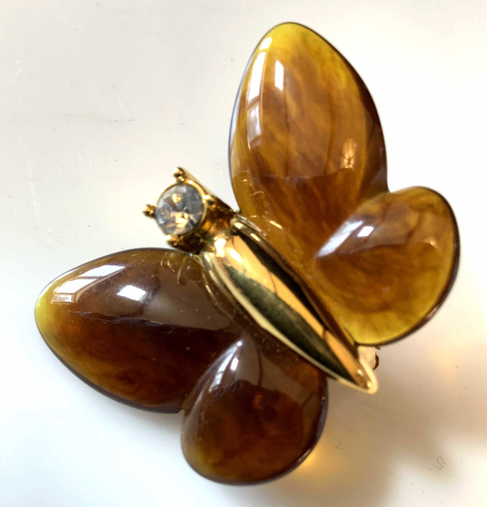 Vintage Bakelite Butterfly Pin: Amber toned butterfly pin possibly Bakelite, brooch, estate jewelry, measures app 1.5 by 1 inch