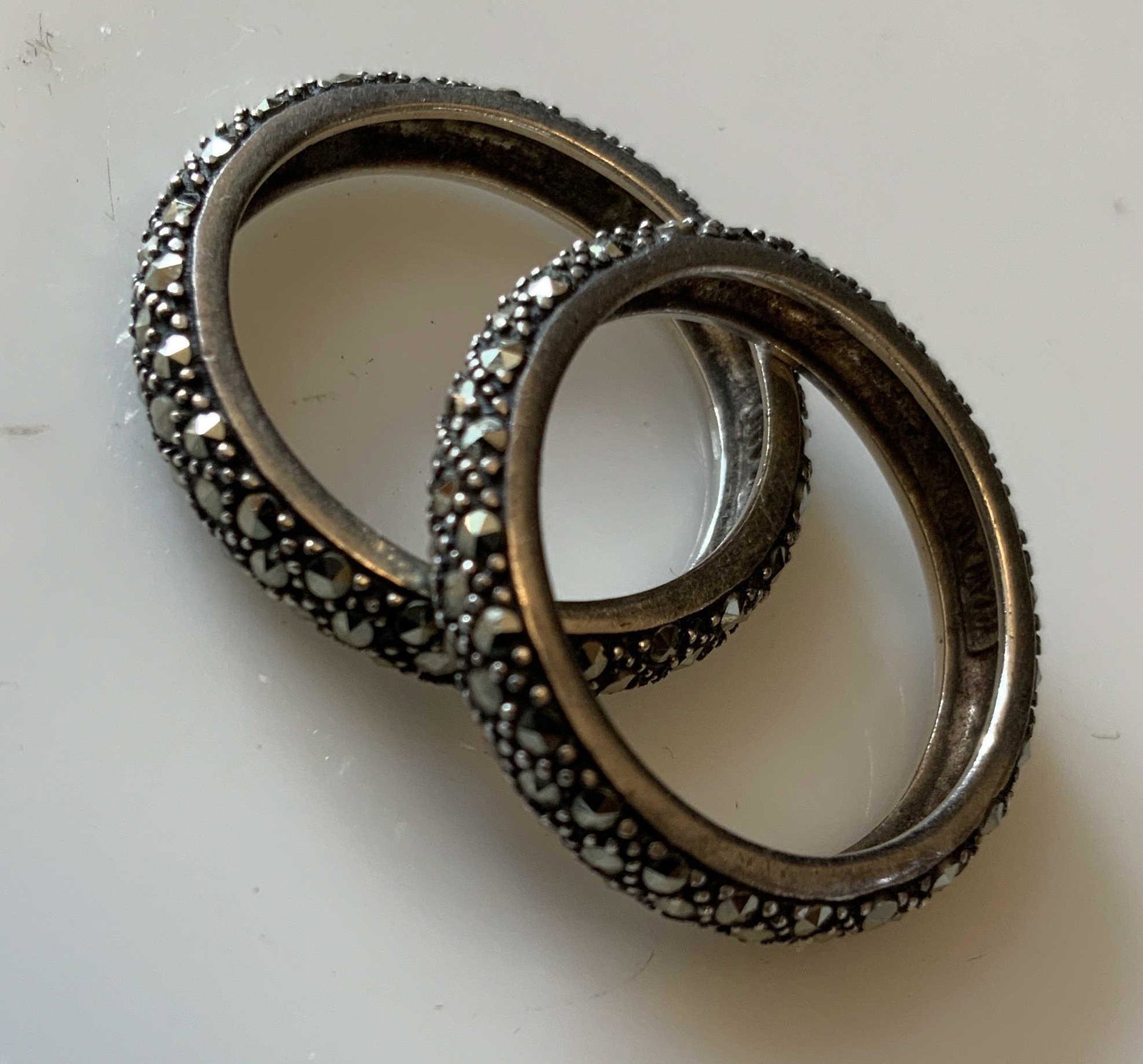 Pair Vintage Sterling Silver Marcasite Rings: Jewelry Vintage band style rings marcasite and Rhinestones marked 925 for sterling silver, diameter each app 1 inches, estate jewelry, vintage jewelry, property of Manhattan Estate