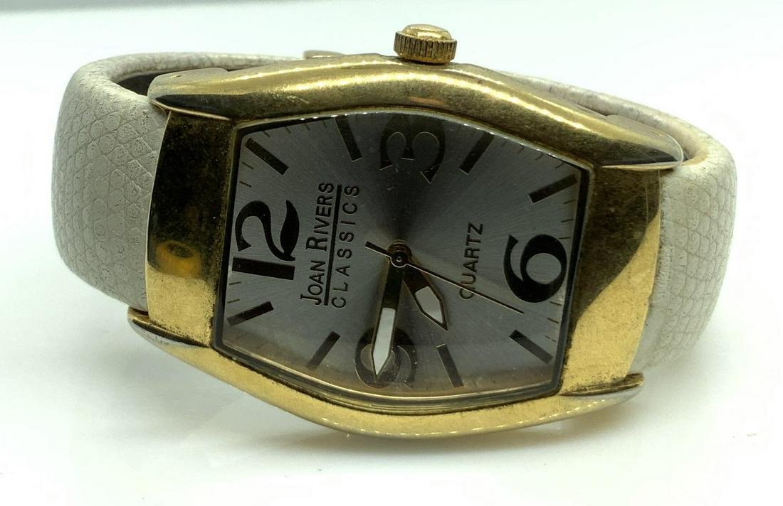 Joan Rivers Leather wrapped Metal Cuff Bracelet: Genuine leather bracelet with watch, wristwatch, jewelry, estate jewelry, vintage watch, cuff measures app 2.5 inches width clock face measures app 2 by 1.5 inches, marked for genuine leather