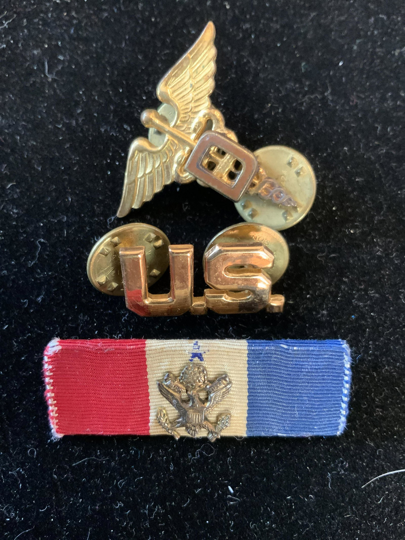Collection of Pins Memorabilia: Pins include Olympic torch, enamel fish, tie pins one for US military, , vintage made in Italy bronze and fabric, , bronze signed Nicholas Fiorentino on back, breast cancer awareness pins, MADD pin, f