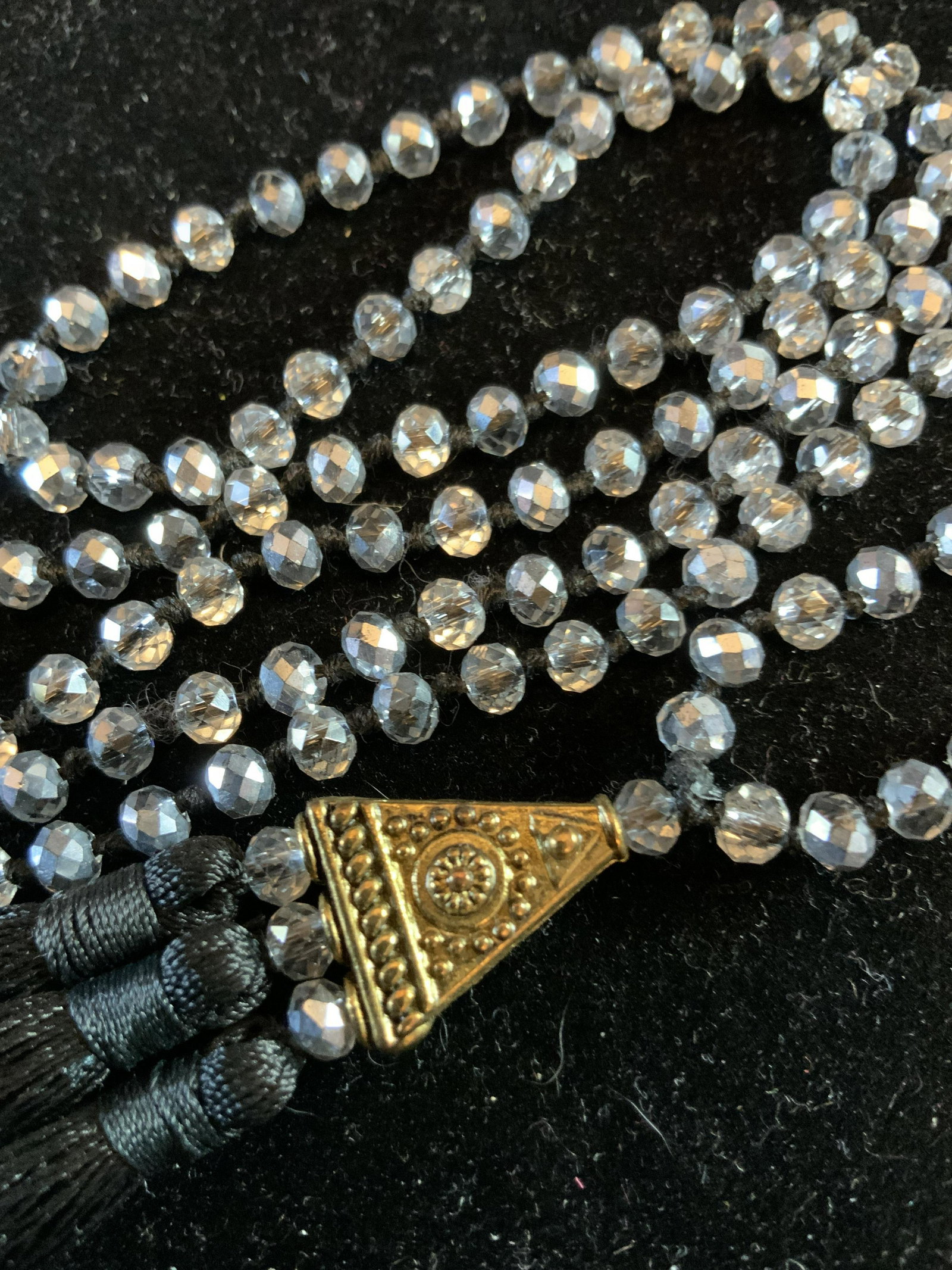 Vintage Crystal Bead and Tassel Necklace: Long strand of faceted sparkly beads crystals, with gold toned tip and silk tassel pendant, vintage jewelry, estate jewelry, fashion jewelry, total drop 21 inches