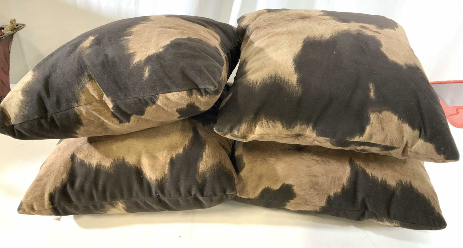 Group 4 Faux Cow Skin Toss Pillows: Brown and toffee colored toss pillows, throw pillows, decorative accessories, home decor, each measures app 16 inches