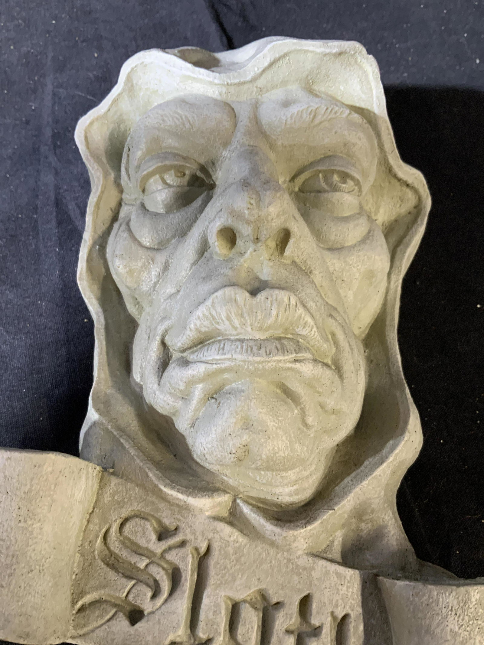 3 J Lester Signed Ceramic Composite Face Figurals: Composite ceramic feel, Label on back reads European styled sculpture hand crafted in Chinafor Toscana, set of three, caricature faces Figurals, each measures app 8 by 7 inches, wall mounts, home deco