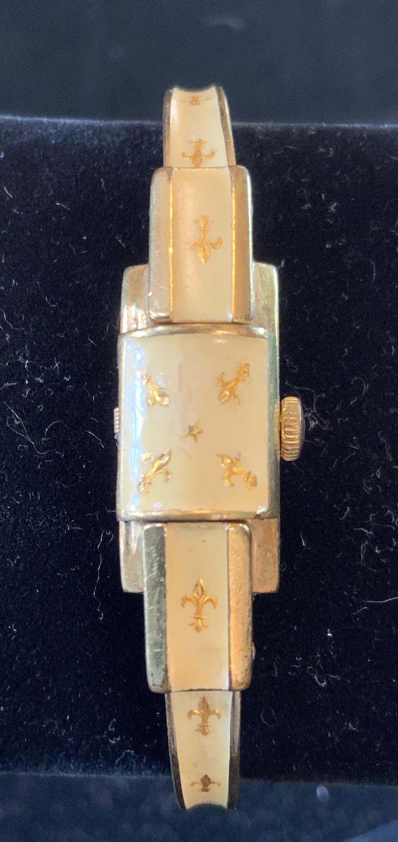 Gold Toned Enamel Bracelet Watch: Signed illegibly on inside of band and watch face, vintage watch, vintage bracelet, vintage jewelry, wearables, fashion accessory, wrist watch