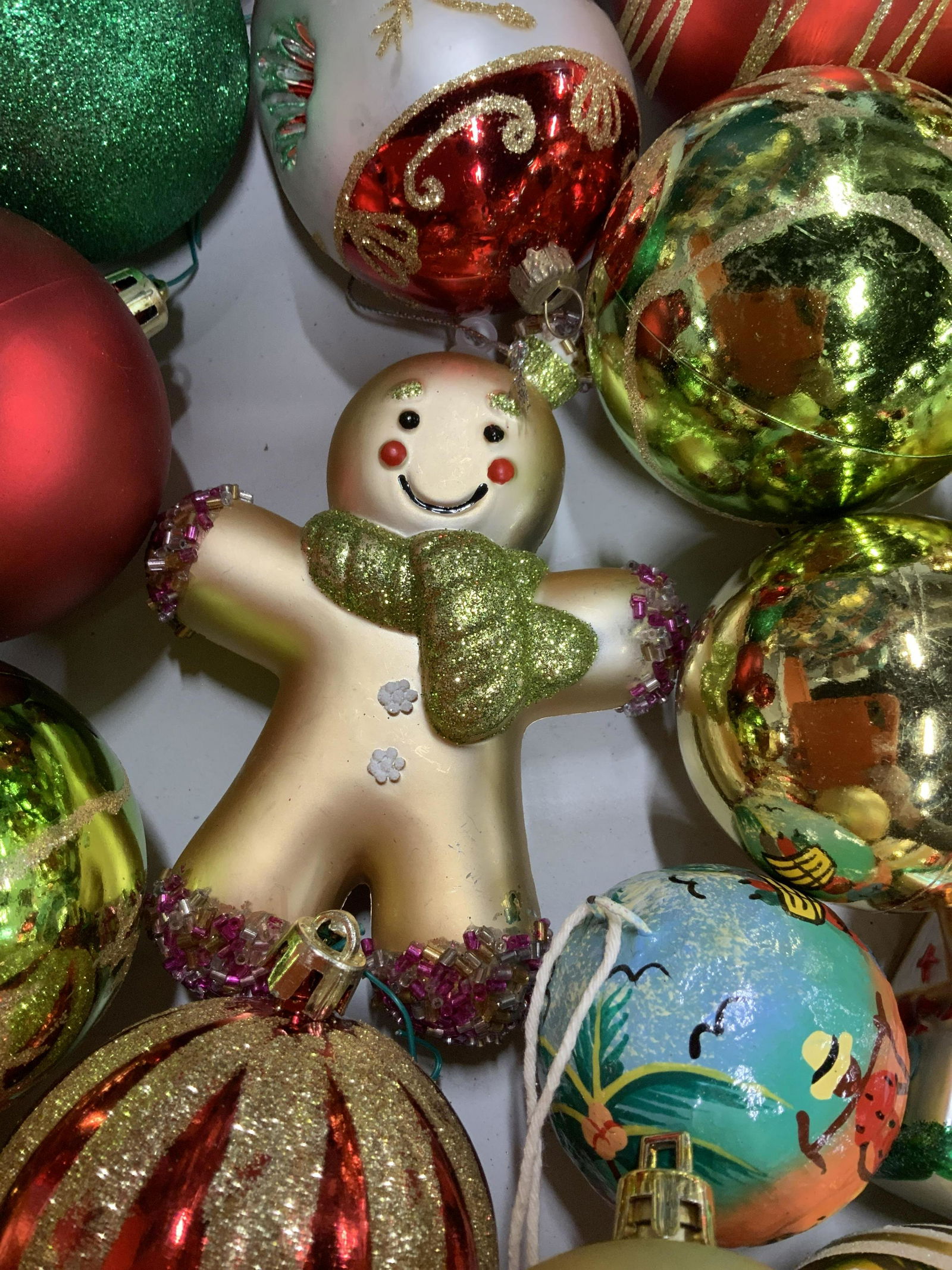 American Eagle Bucket w Vintage Ornaments: Metal cylindrical bucket in shape of drum with American eagle design, lid and rope handle measures 14 inches ht diameter app 11 inches, was storage for and comes with vintage Christmas tree glass orna