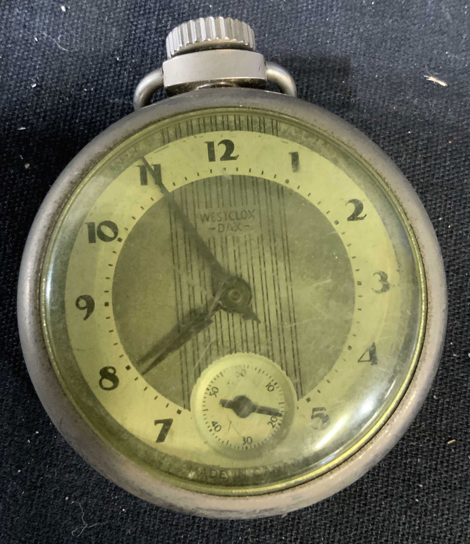 Vintage Possibly Antique Pocket Watch: Pocket watch, collectible, diameter app 2 inches, silver toned casings, face reads Westclox Dax
