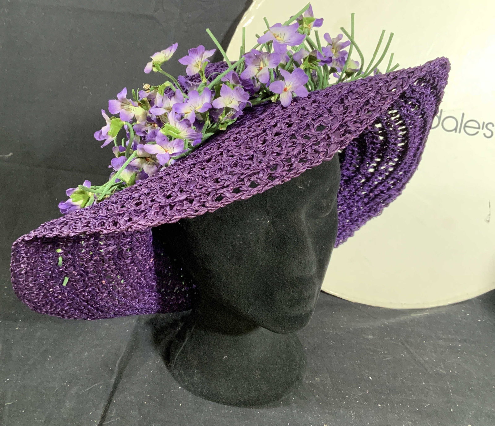 Vintage Bloomingdales Straw Hat w Flowers: Blooming dales large hat box diameter 17 inches ht 9 inches, has wear, holds purple straw hat with ring of violet toned flowers, inside of hat measures app 7.5 inches, vintage hat, spring bonnet,
