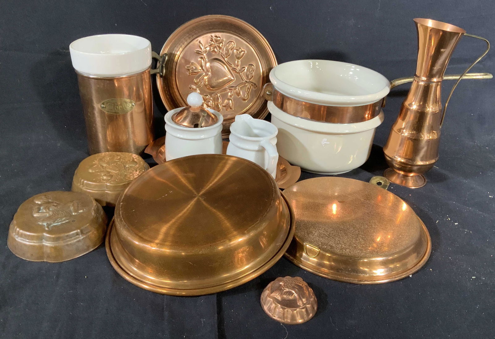 Vintage Copper Porcelain Group Lot: Some marked England, some illegible, two molds possibly antique, group copper table ware, kitchen ware, serve pieces, pitcher marked for England ht 9.5 inches collectible copper ware