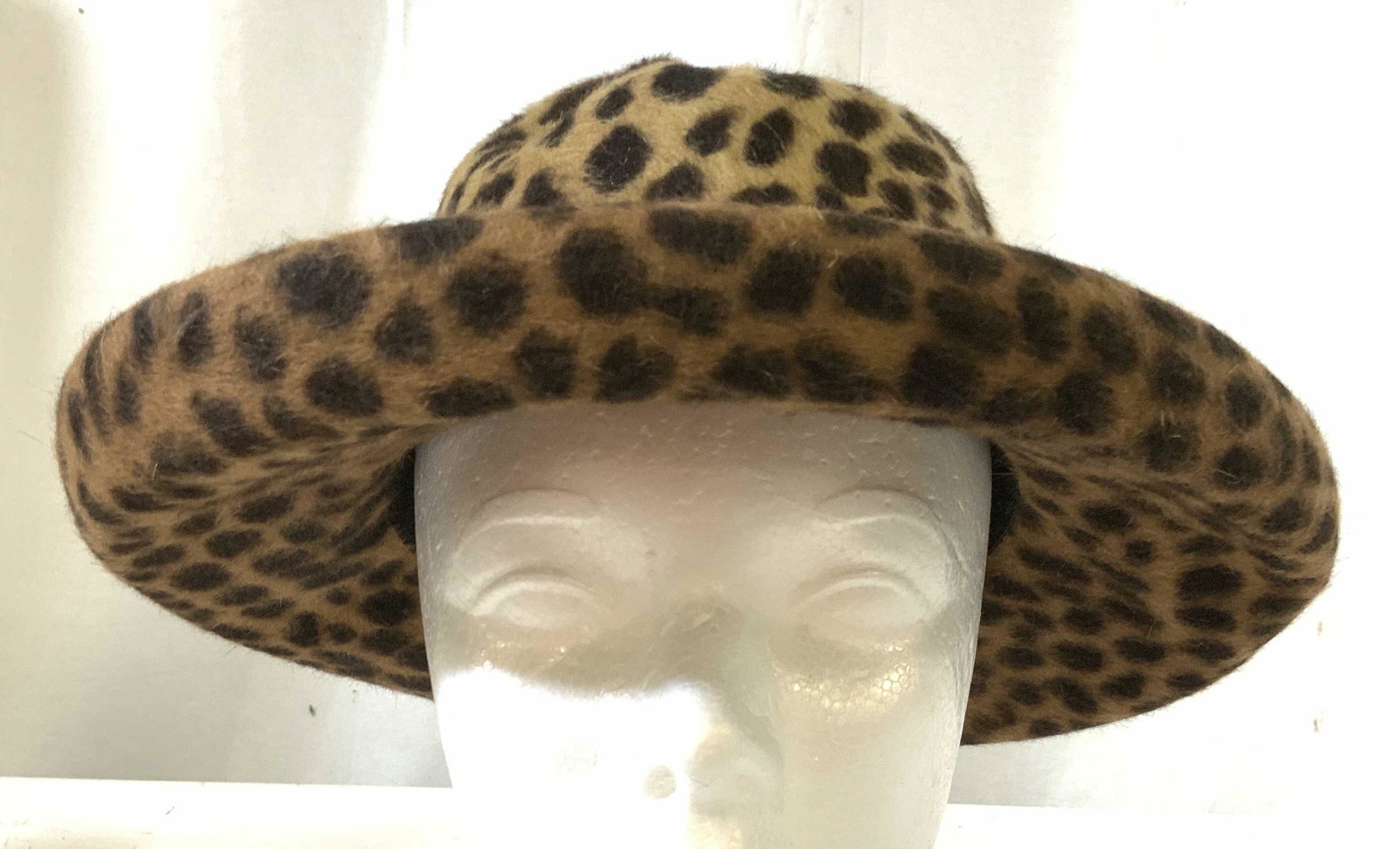 ERIC JAVITZ Vintage Leopard Print Hat: Two tone leopard hat, feels like velvet fabric, inside label reads Eric JAVITZ Hats, blocked and trimmed by hand, luxury fashion accessory, luxury fashion accessory, inside measures app 7.5 inches