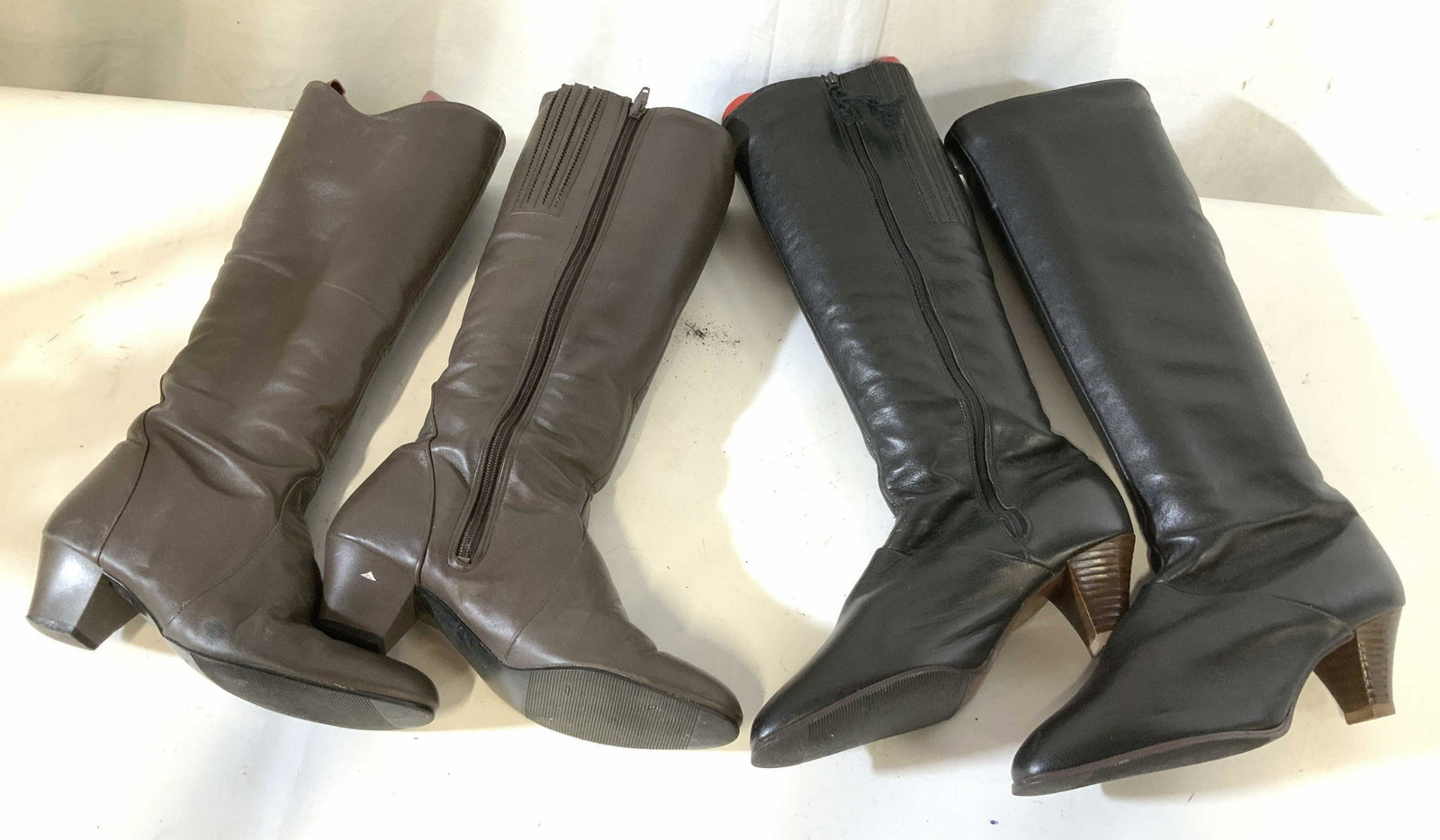 2 Pairs Tall Leather Boots: Appear to be custom made for Size 8 , each measures ht 19 inches, never worn, good condition, brown leather and black leather, each with plastic insert form, boots, fashion, wearable,