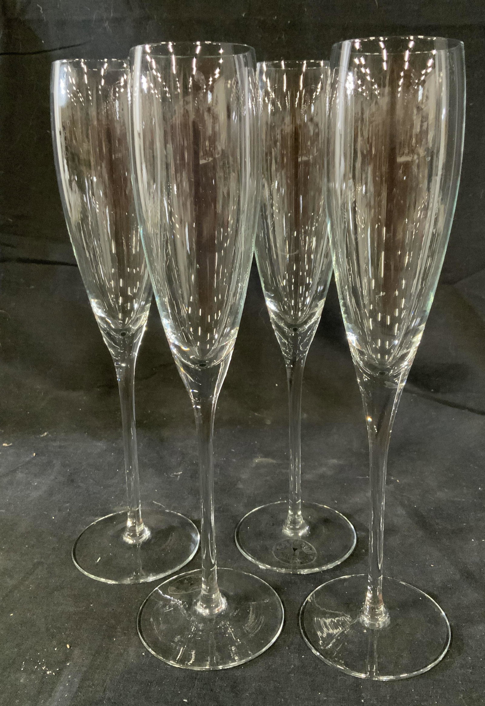 6 Crystal Table Ware Stemware: Four hand blown crystal champagne flutes ht 10.5 inches, one cut crystal bud vase one candle stick, group lot, stemware, vessels, drinking glasses, barware, champagne glasses,