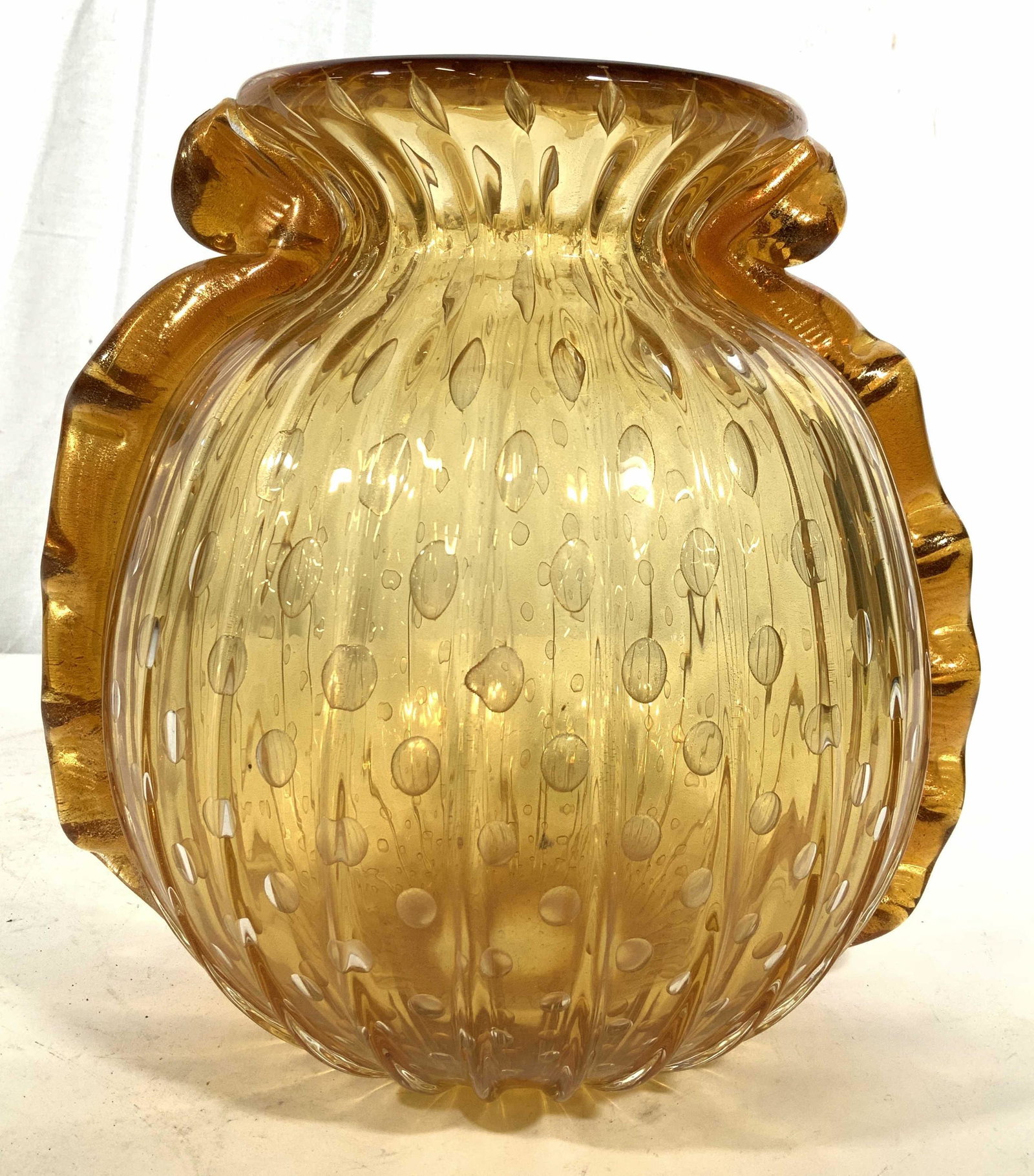 Vintage Heavy Murano Art Glass Vase: Gold flecked amber toned thick and heavy glass, hand formed with polka dot design and wave form reliefs to sides, quality vase, vessel, Italian decorative arts, arts and crafts, table ware, measures h