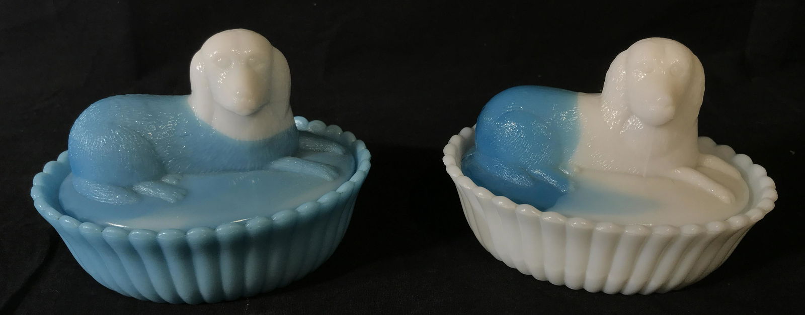 Vintage Pair of Milk Glass Dog Figural Dishes: Vintage possibly antique pair of blue and white milk glass lidded dishes, dog figural on the lid of each, tallest point measures 4 inches and widest point measures 5.5 inches, dish 1 is mainly a pale