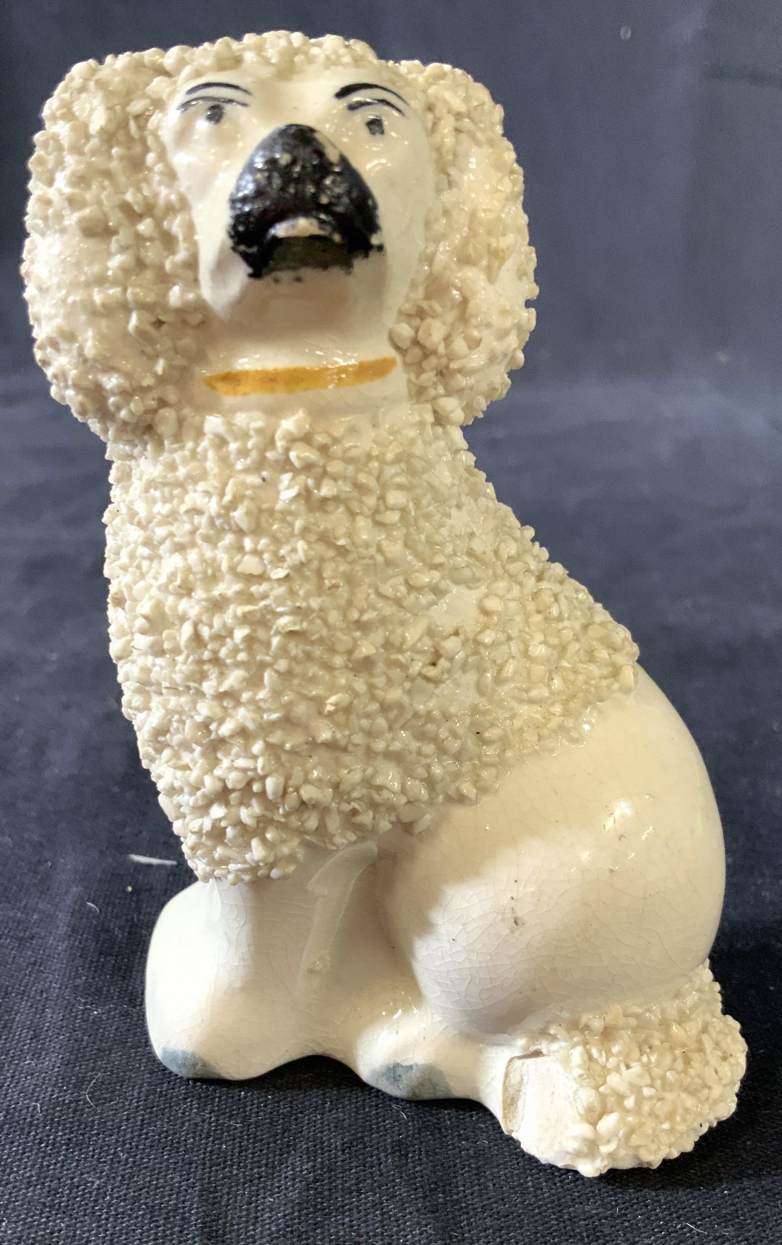 Antique English Porcelain Spaniel: In the style of Staffordshire porcelain, figural of spaniel, white with black eyes and nose, yellow color, some losses to paint, collectible, tableware, tabletop decor, staffordshire style, animal sta